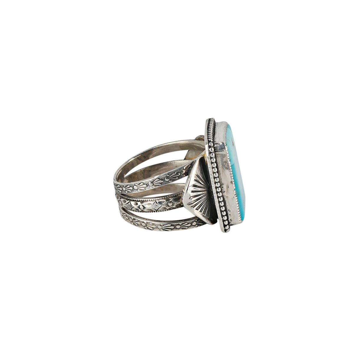 A mosaic ring of Blue Turquoise set in Sterling Silver. A beloved piece from the Sundance Catalog.