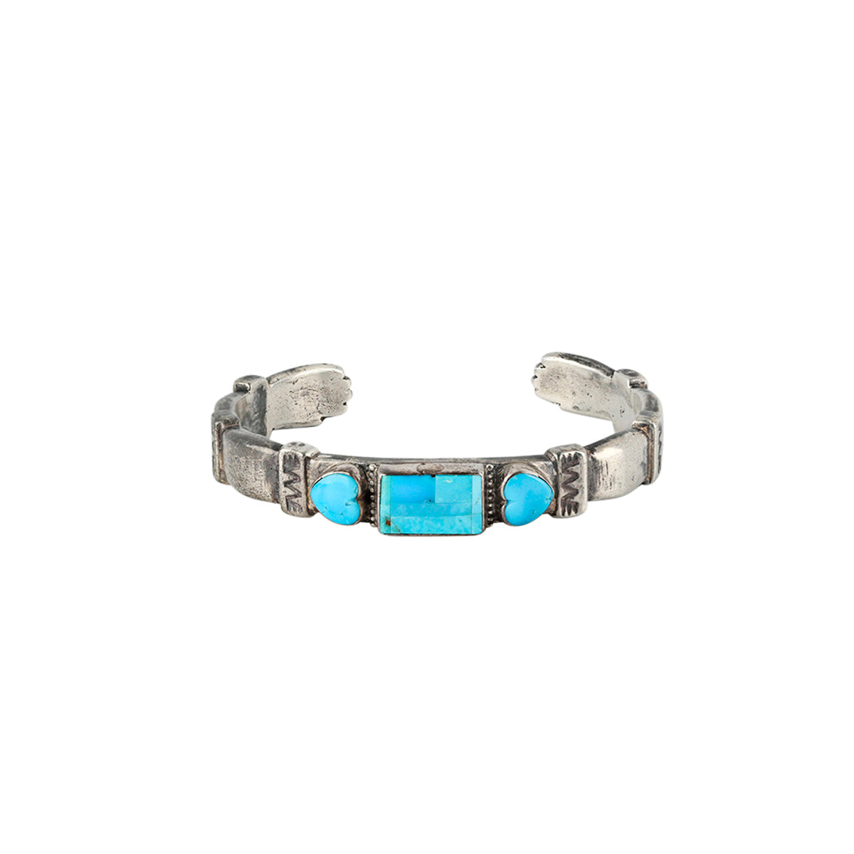 Sterling silver cuff with Turquoise inlay in heart shapes. 