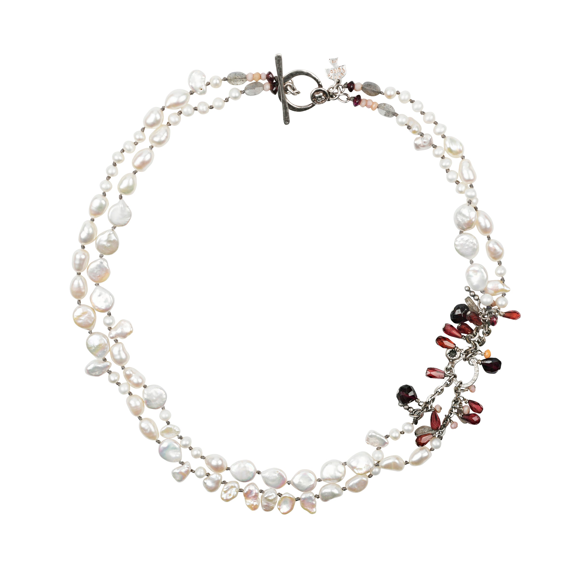 A Sundance Catalog favorite, the Pearl Melange Necklace is a multi-strand necklace strung with Freshwater Pearls and charms of Garnet, Rhodochrosite, and Labradorite