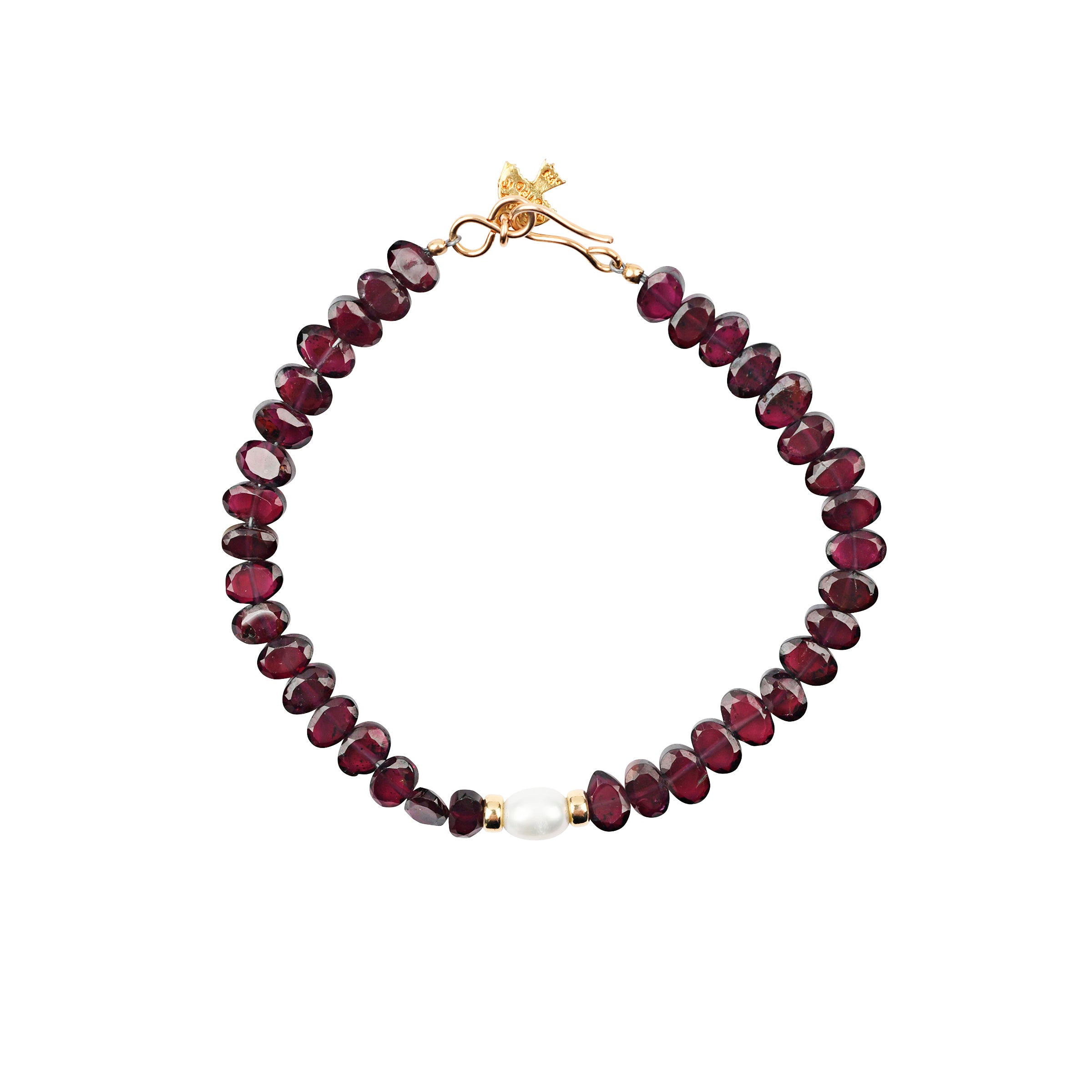 A Peyote Bird Original beaded bracelet strung with oval Garnets, 14k Gold Plated accent beading,  and a Freshwater Pearl as the centerpiece. Finished with a 14k Gold Plated hook and loop toggle for a secure fit.