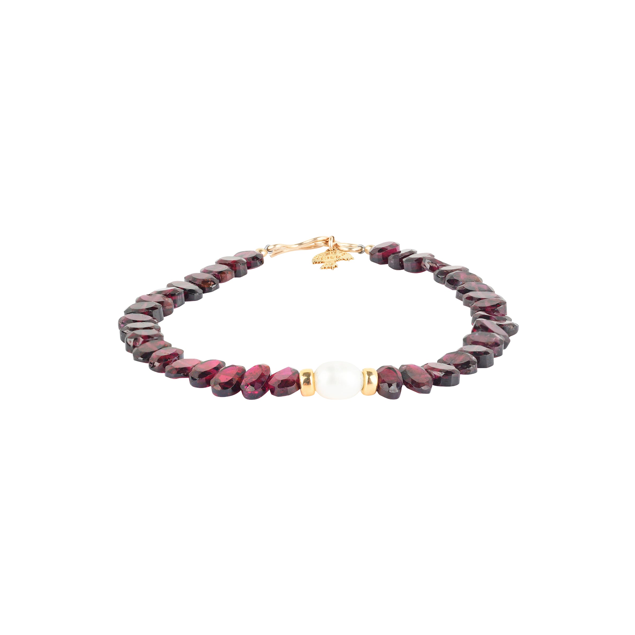 A Peyote Bird Original beaded bracelet strung with oval Garnets, 14k Gold Plated accent beading,  and a Freshwater Pearl as the centerpiece. Finished with a 14k Gold Plated hook and loop toggle for a secure fit.