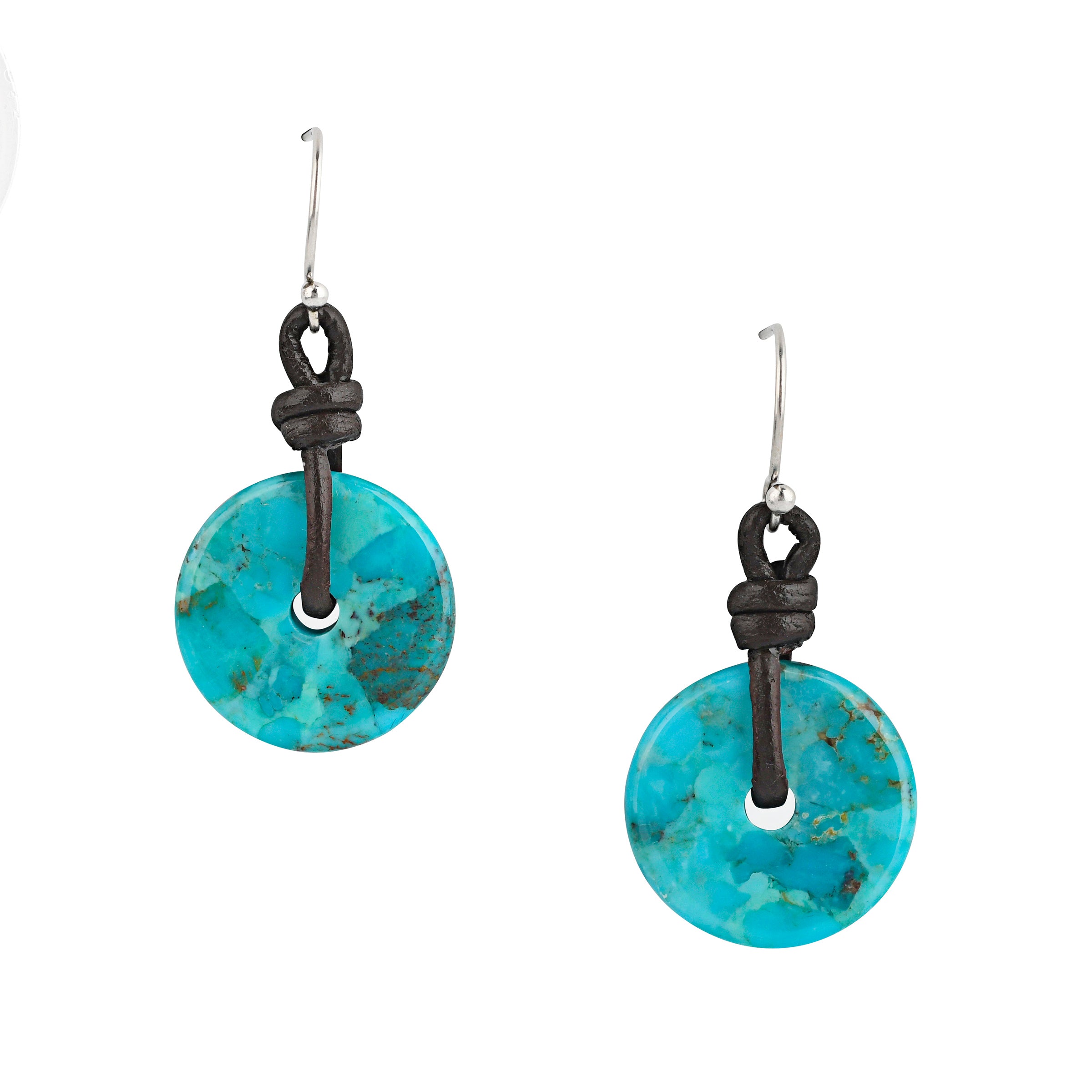These earrings are made up of carved discs of Turquoise strung on brown leather.