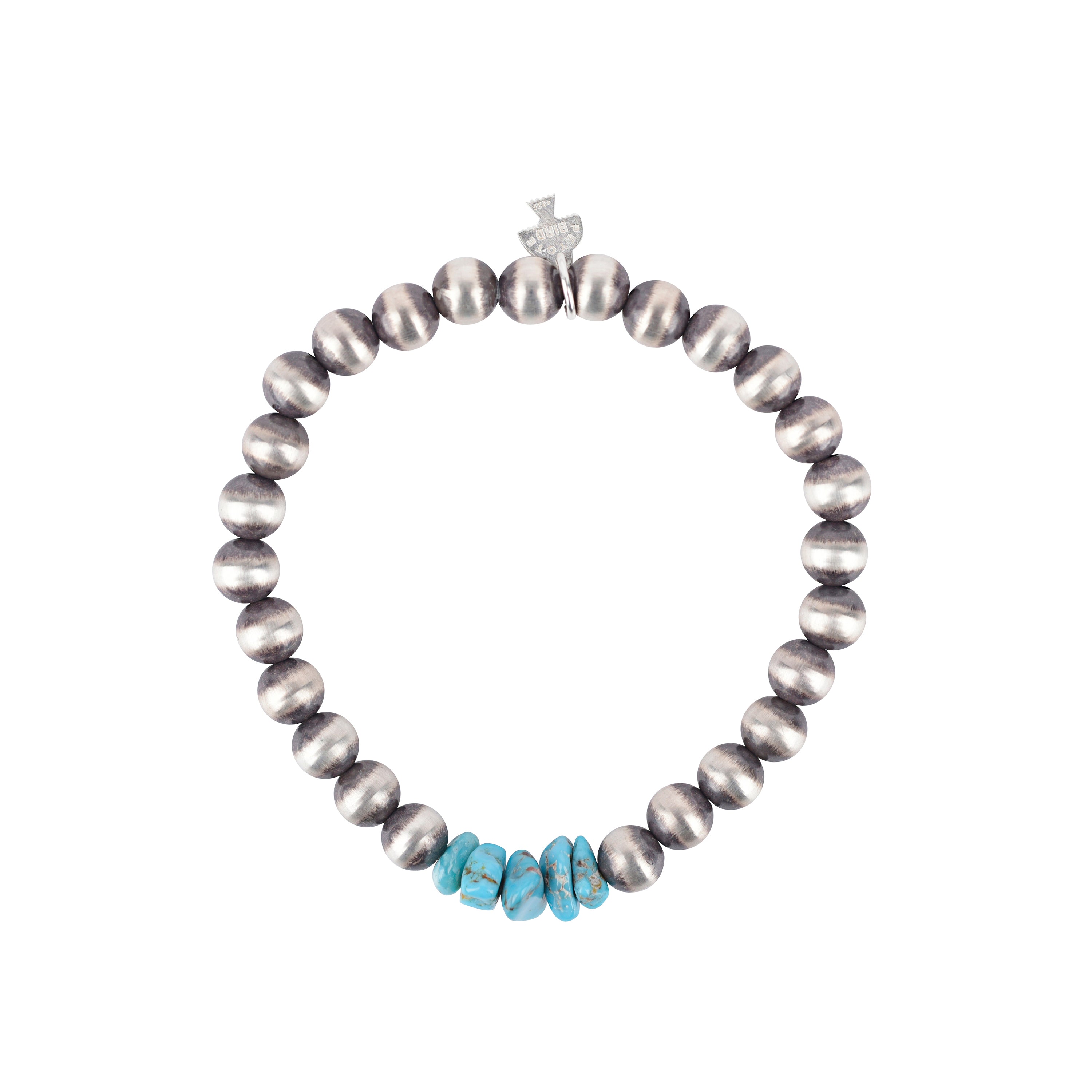 A stretch bracelet strung with Desert Pearls and Turquoise Heishi Beads