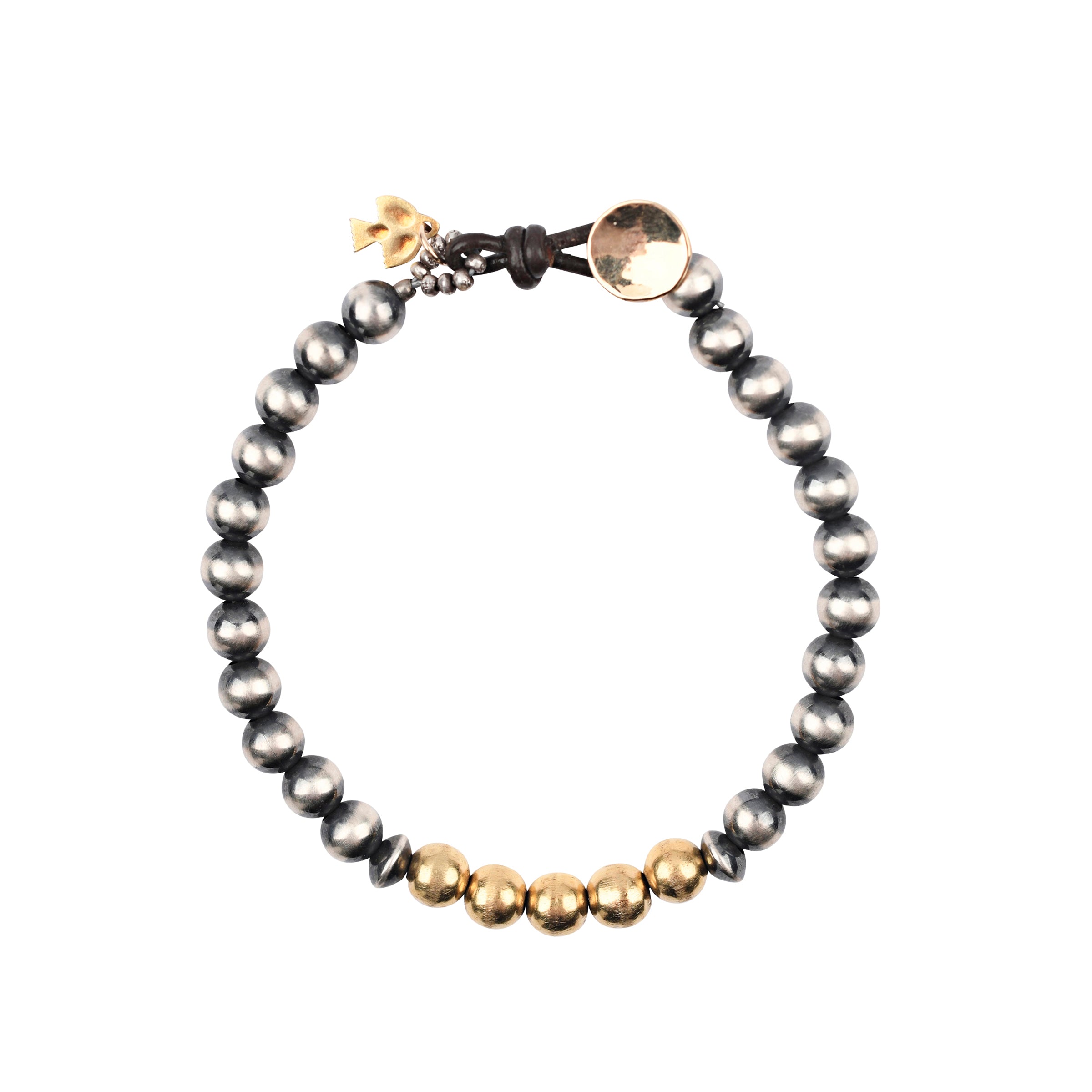 The Chiaroscuro Bracelet is strung with Sterling Silver Desert Pearls and features a row of 14k Gold Plate beading as the centerpiece.