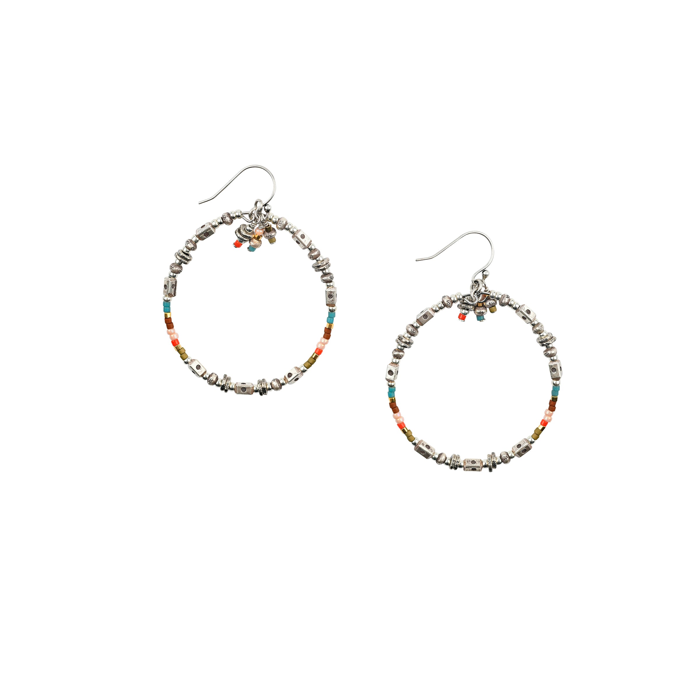 A Sundance Catalog favorite - the Triple Playful Earrings are a pair of beaded hoops featuring glass beading and stamped Sterling Silver Thai beading.