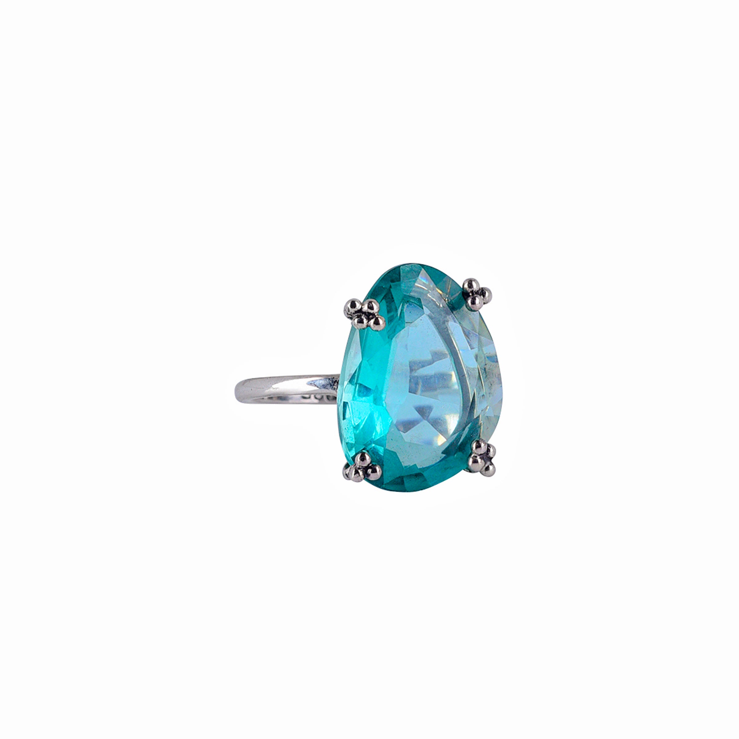 bright blue dyed aquamarine stone set in sterling silver with plain silver band ring 