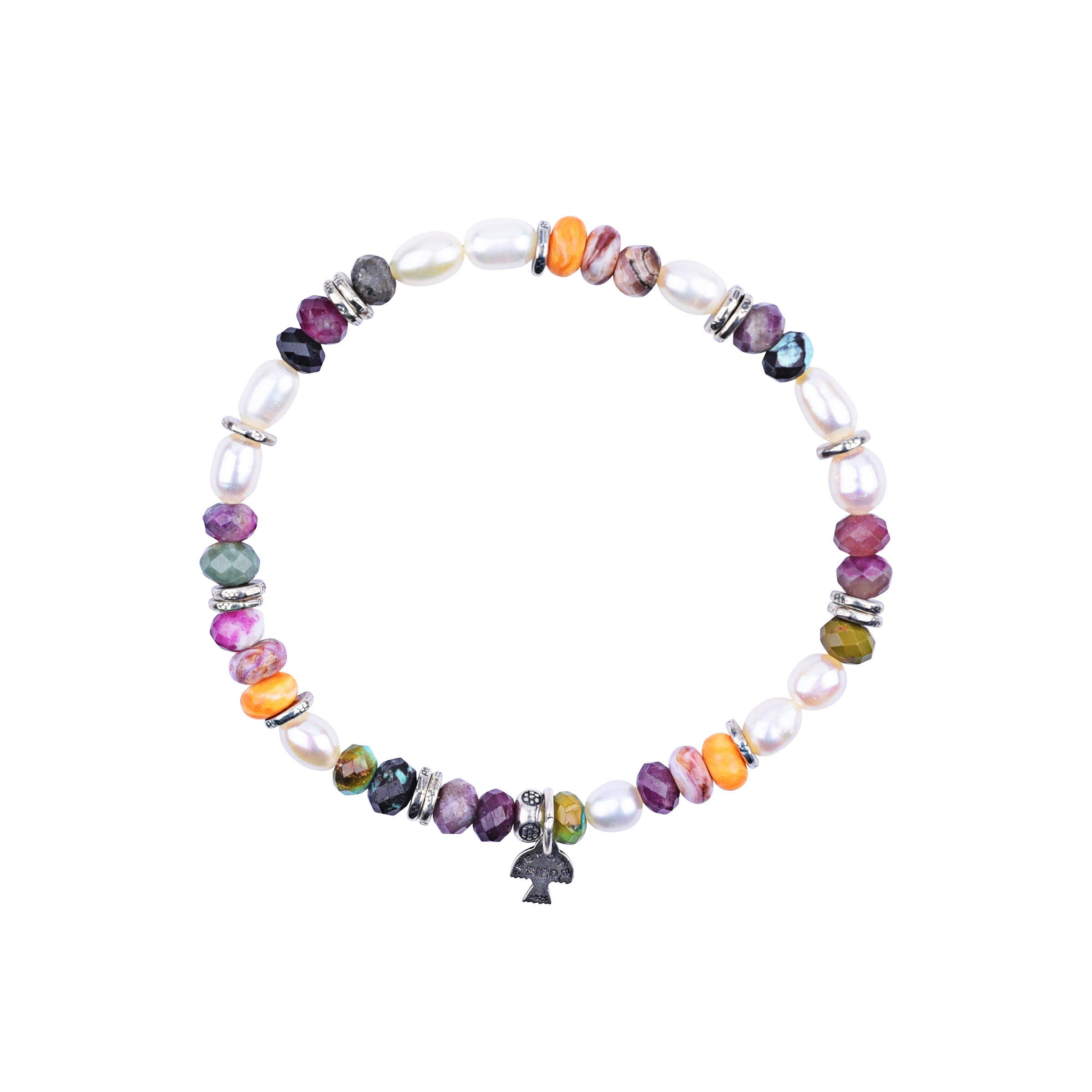 Monument Valley Multi Stretch Bracelet featuring Tourmaline, Turquoise, Orange Spiny Oyster Shell, and Pearl topped with delicate Sterling Silver spacers.