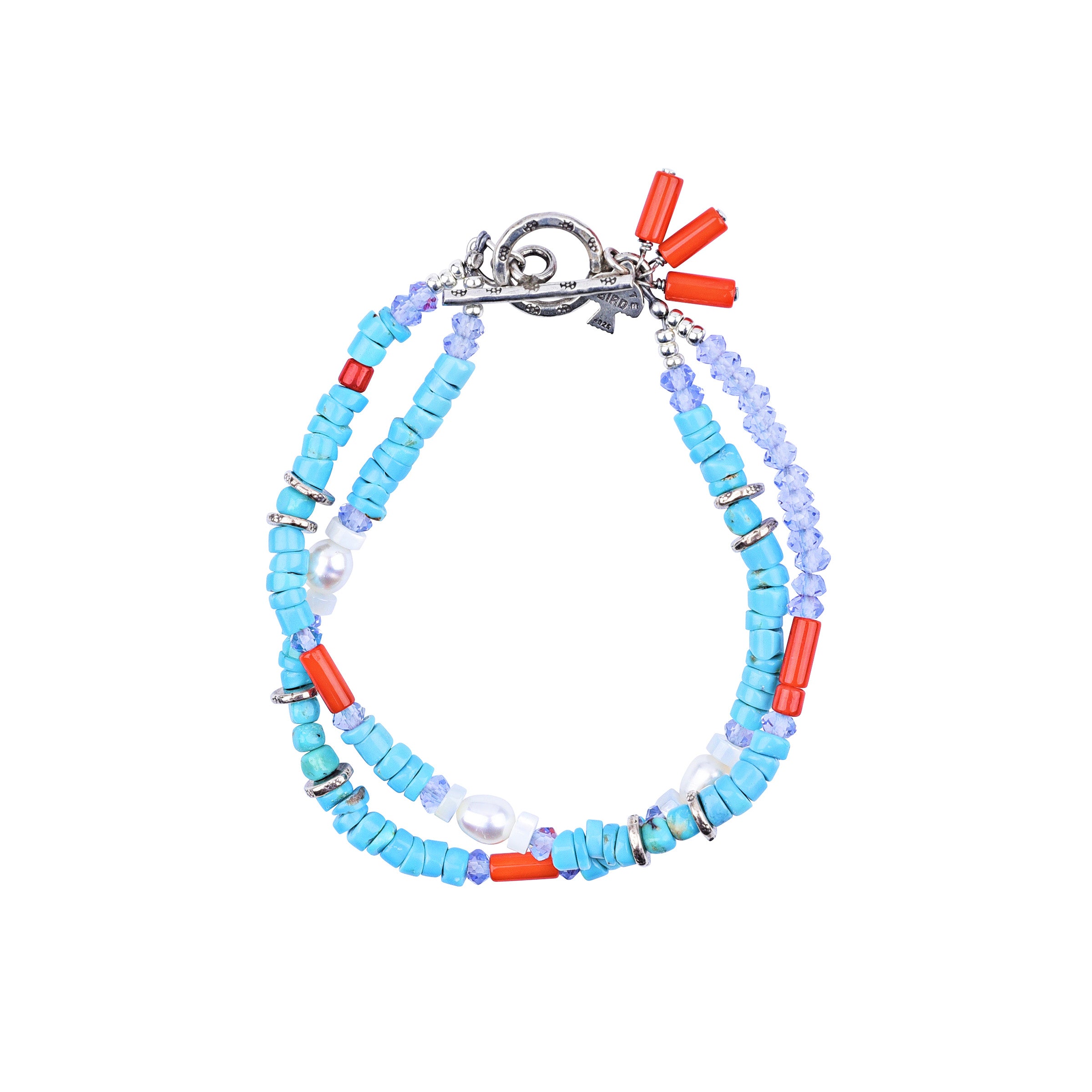 Experience the unique beauty of the waves with our Oceanus Bracelet. Adorned with delicate Mother of Pearl, Blue Turquoise, and Red Coral pieces. Peyote Bird Original. Made in USA.