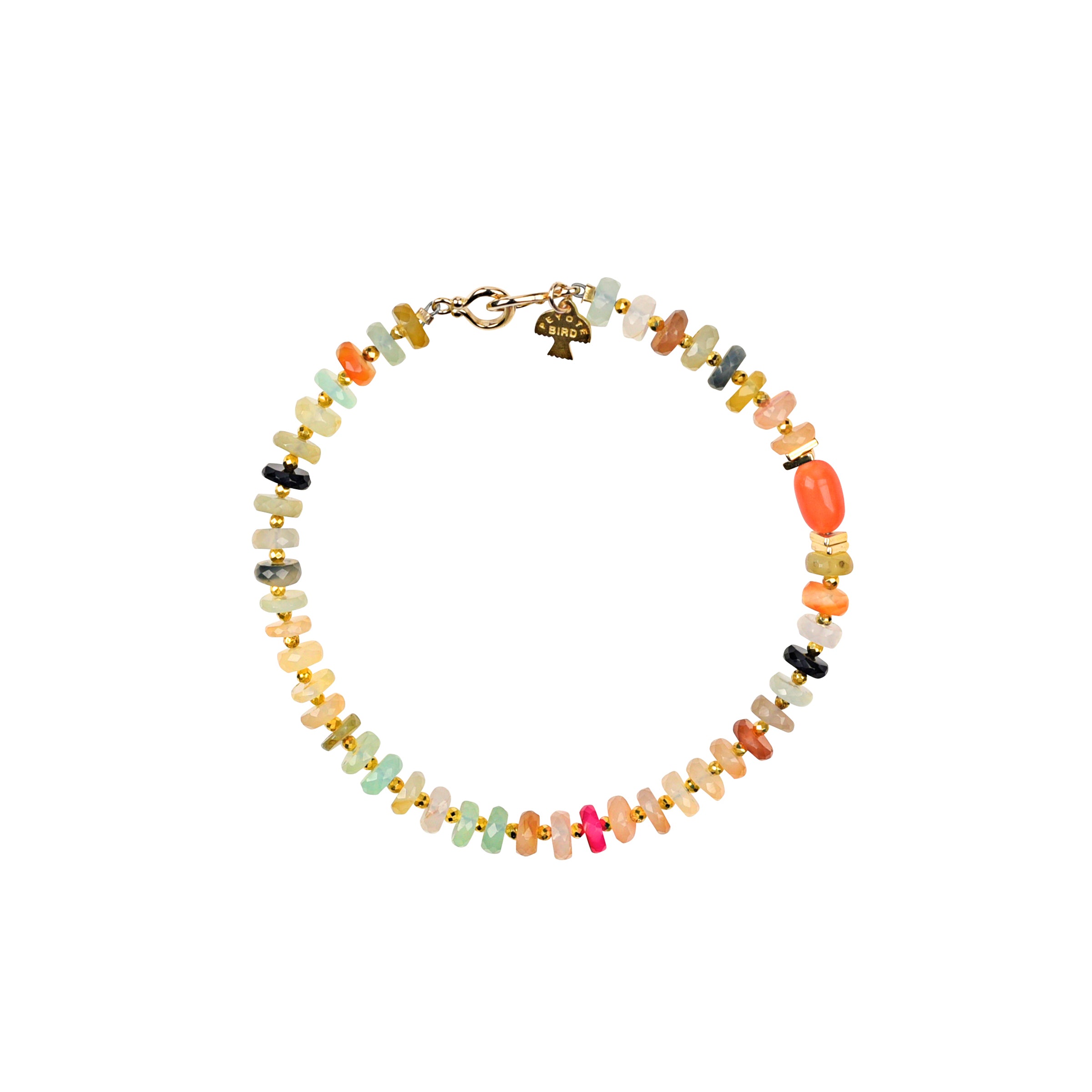 The Shanti Bracelet is a gorgeous beaded piece strung with a medley of Chalcedony beading topped with an Orange Spiny Oyster Shell accent bead.