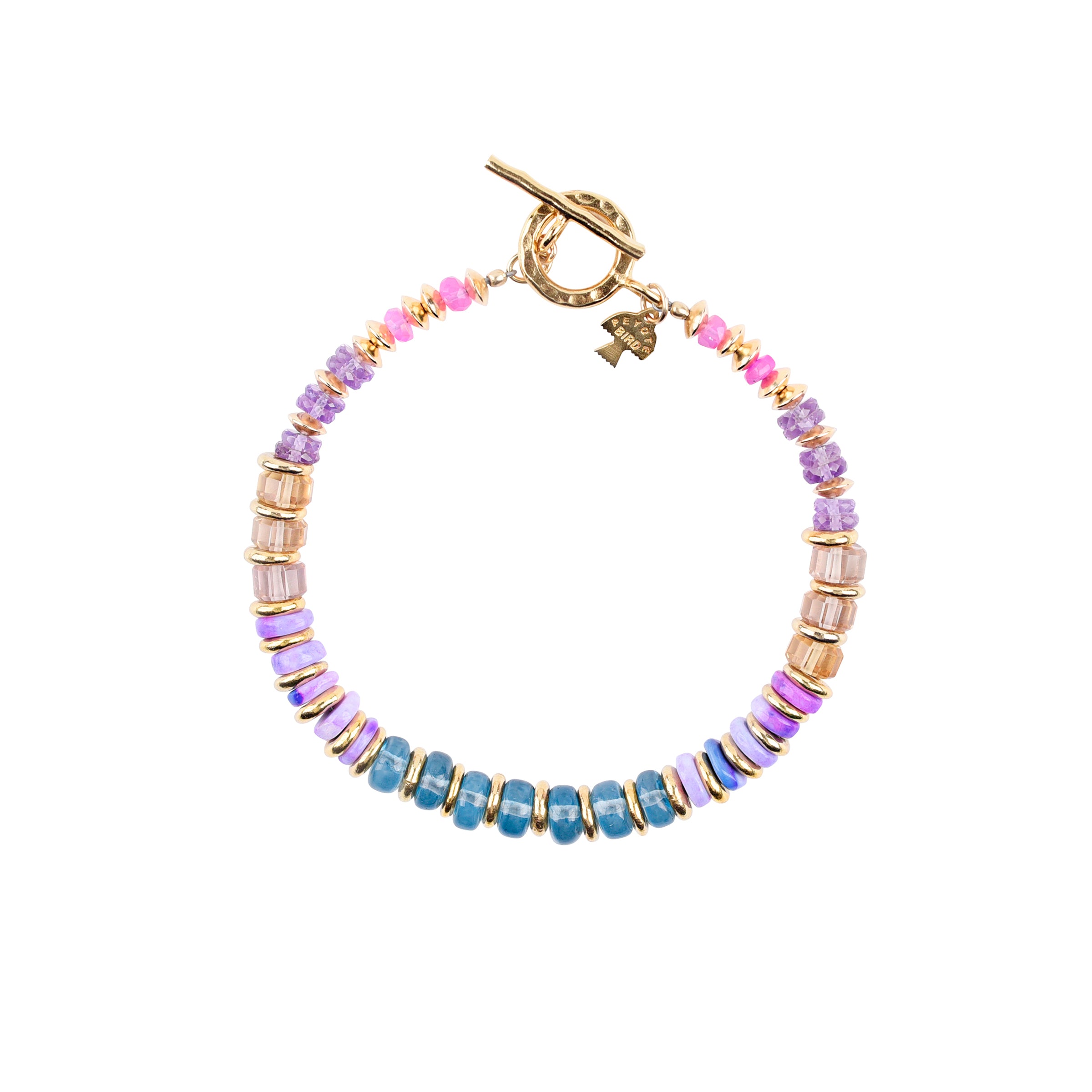 This brilliant and vibrant beaded bracelet is strung with Ethiopian Opals, Amethyst, Smokey Quartz, and Blue Crystal as the main centerpiece.