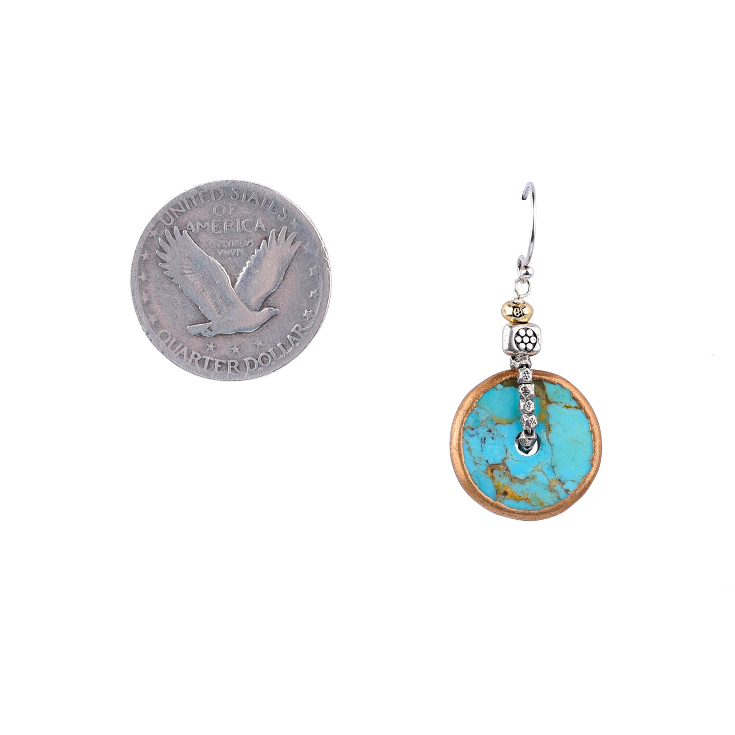 A pair of turquoise disc earrings with  14K gold plate and sterling silver.