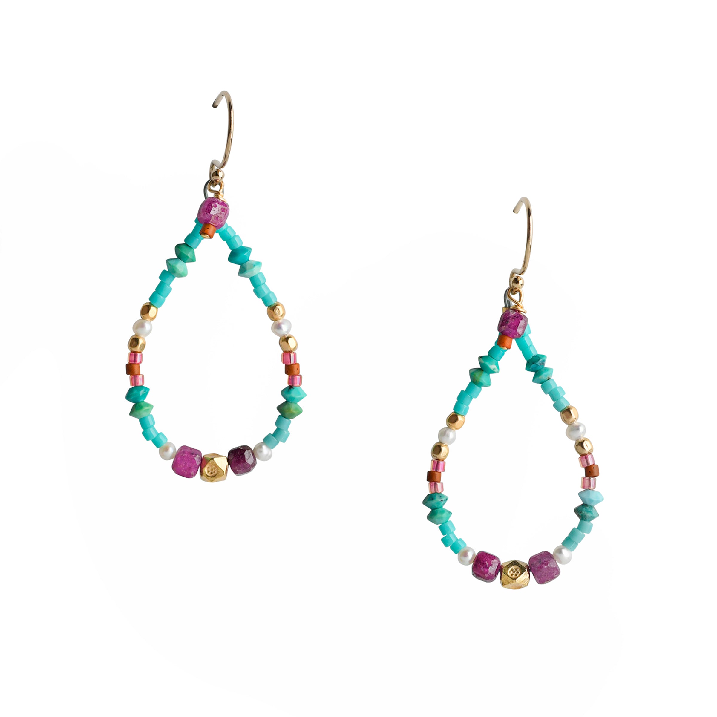 A vibrant pair of teardrop beaded earrings strung with Turquoise, Ruby, and Freshwater Pearl with 14k Gold Plate accents.