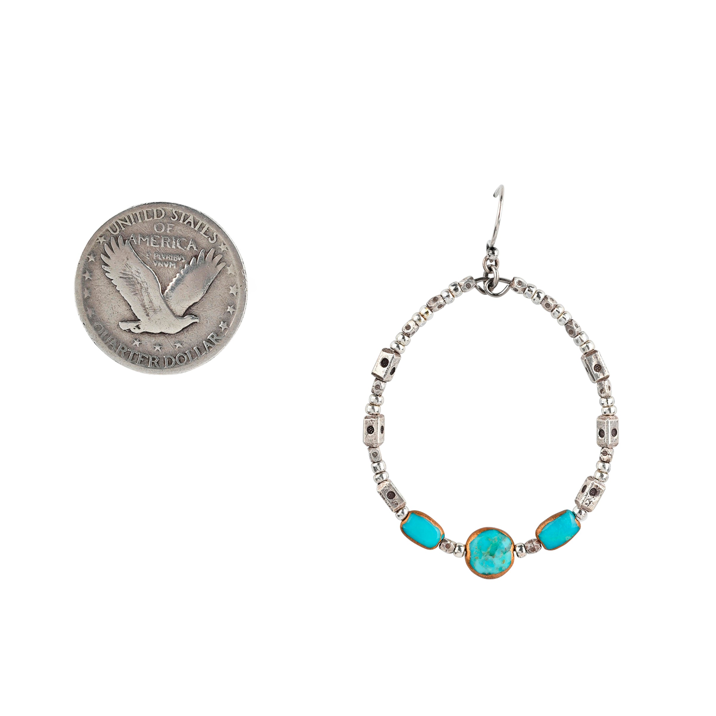 the See You Around Earrings are a gorgeous blend of mixed metals featuring stamped Sterling Silver Thai beading and electroplated Turquoise as the centerpiece. Set to face forward or swivel to the side, this earring will be loved at all angles.