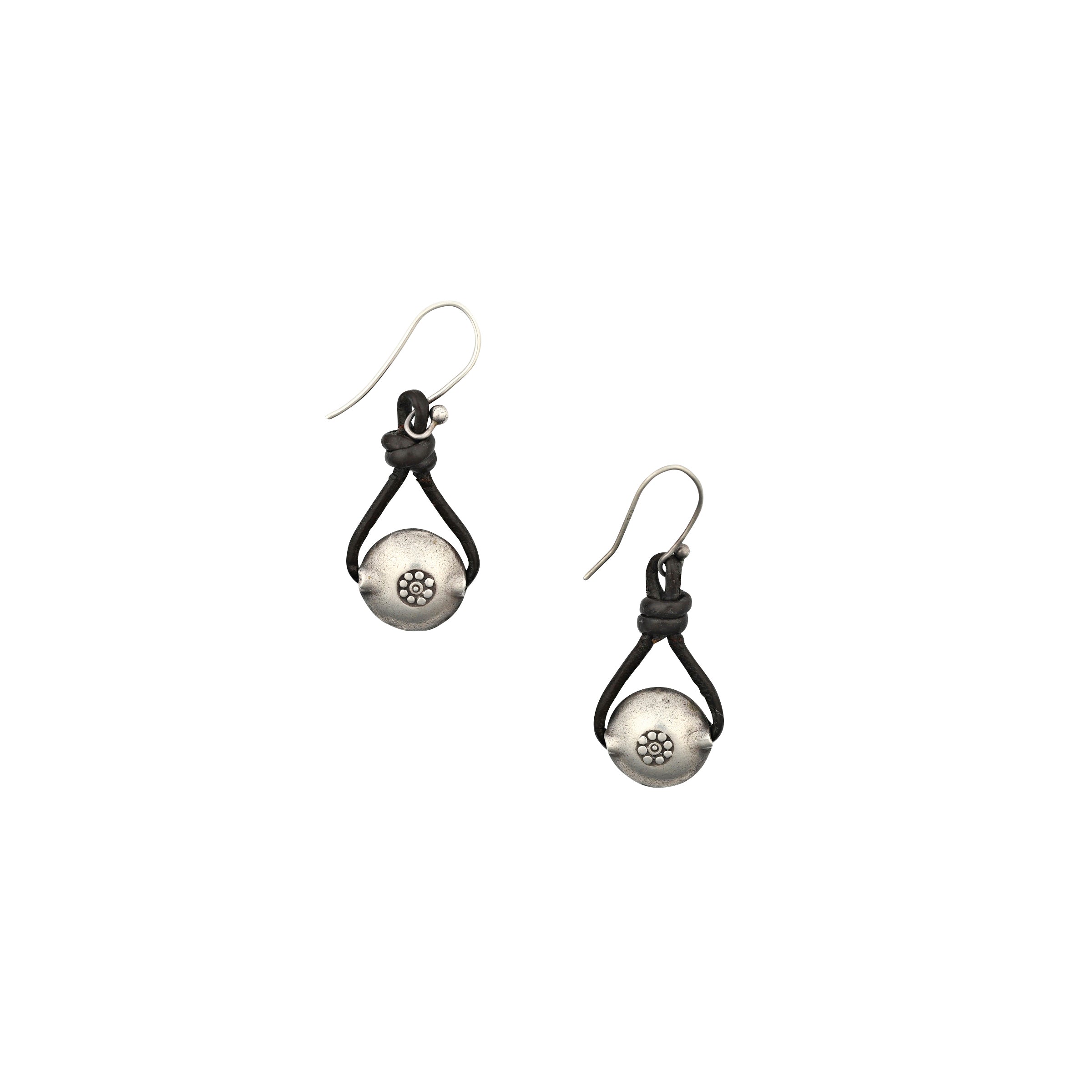 The Denim's Best Pal Earrings were consistently a Sundance Catalog bestseller! Designed with Denim in mind, these earrings are the perfect addition to your everyday look. Featuring leather loops with a stamped Sterling Silver bead as the centerpiece.