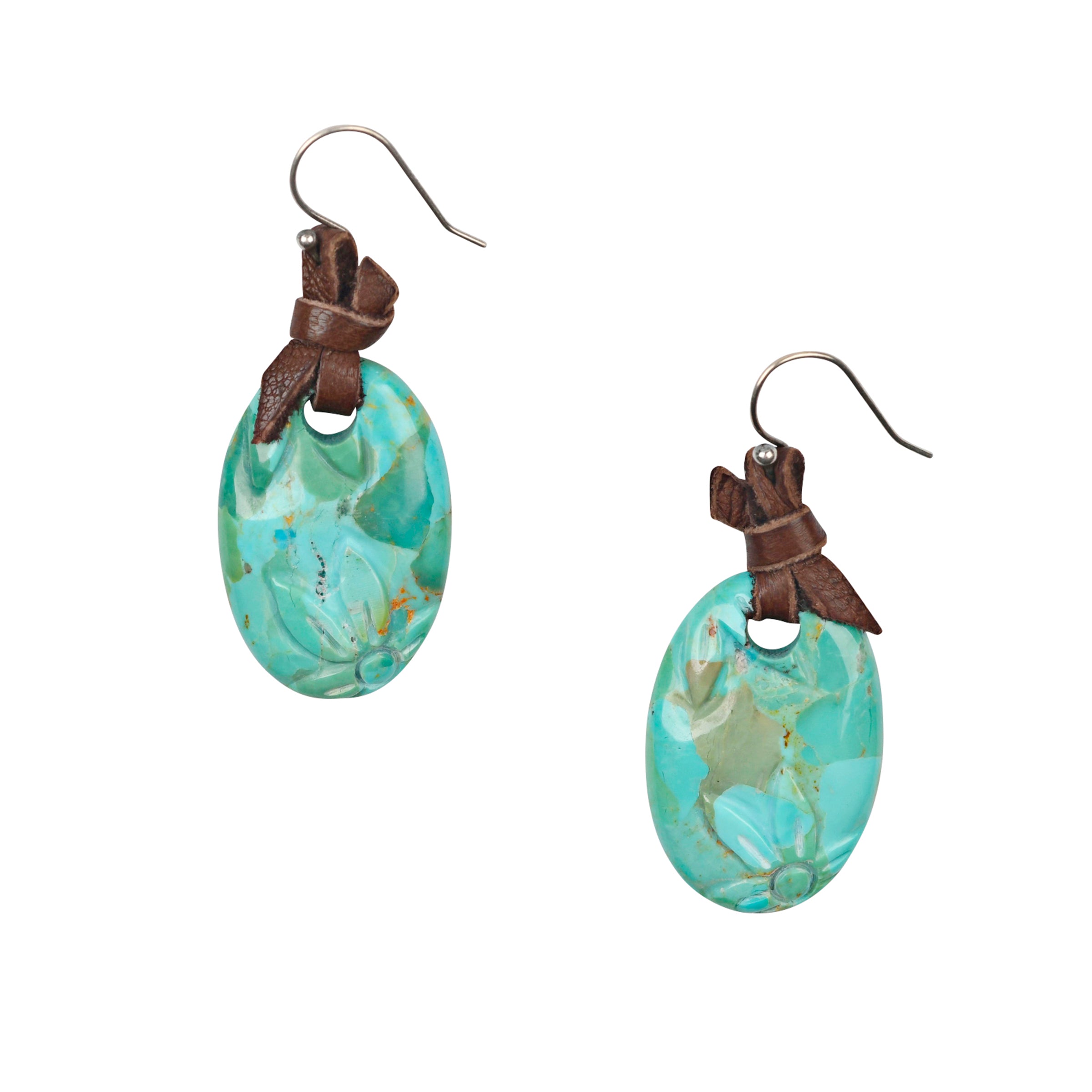 Oval Blue Turquoise Earrings with carved flowers hung on soft deerskin tied leather