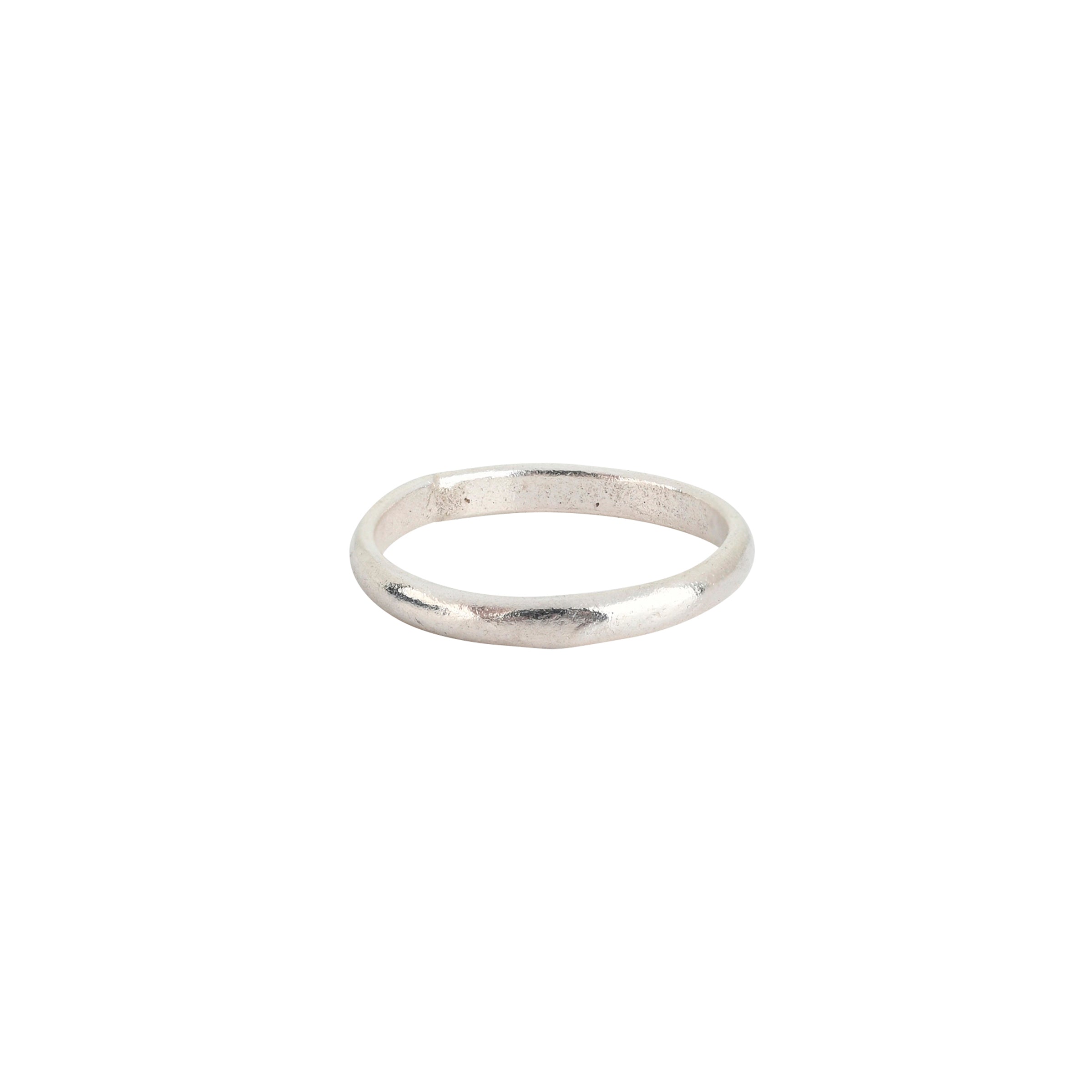 This set is comprised of three rings, meant to be stacked in any combination. Featuring a dotted Sterling Silver band with inlayed Turquoise, a plain Sterling Silver band, and finally a textured 14k Gold Plate band.