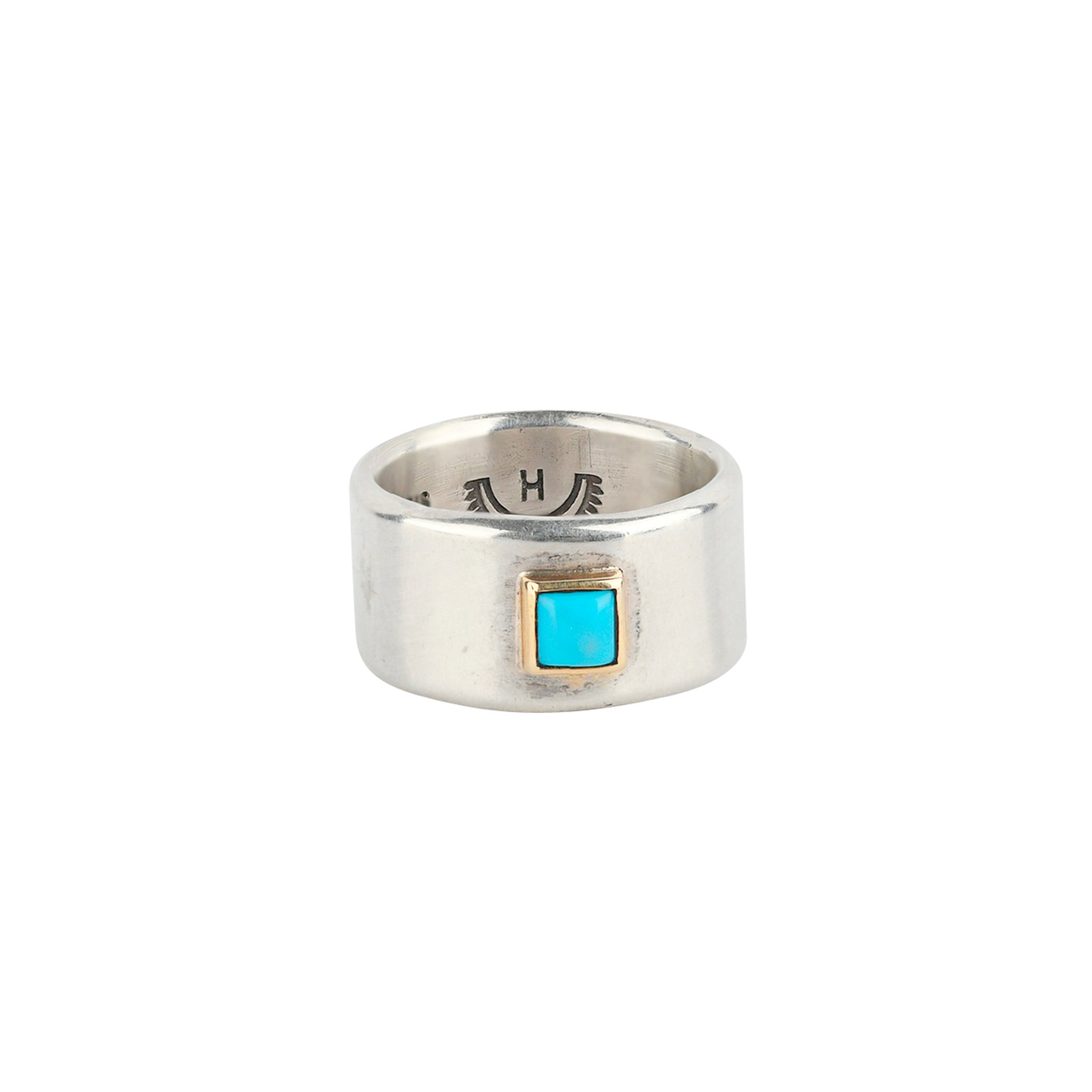 Sterling silver large band ring with square turquoise stone and gold bezel setting. 