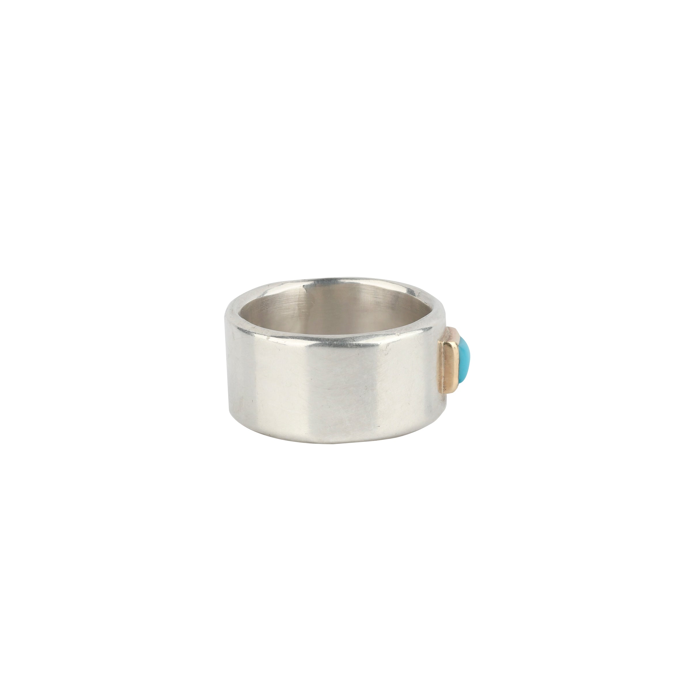 Side Profile of Sterling silver large band ring with square turquoise stone and gold bezel setting.