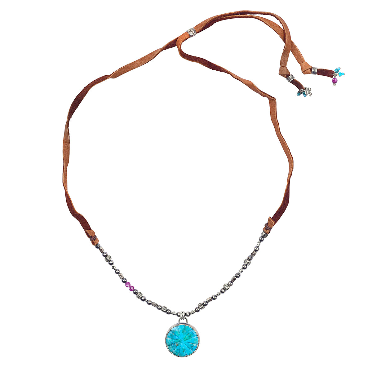 Turquoise carved pendant necklace surrounded by Thai sterling silver and leather with adjustable slider bead length. 
