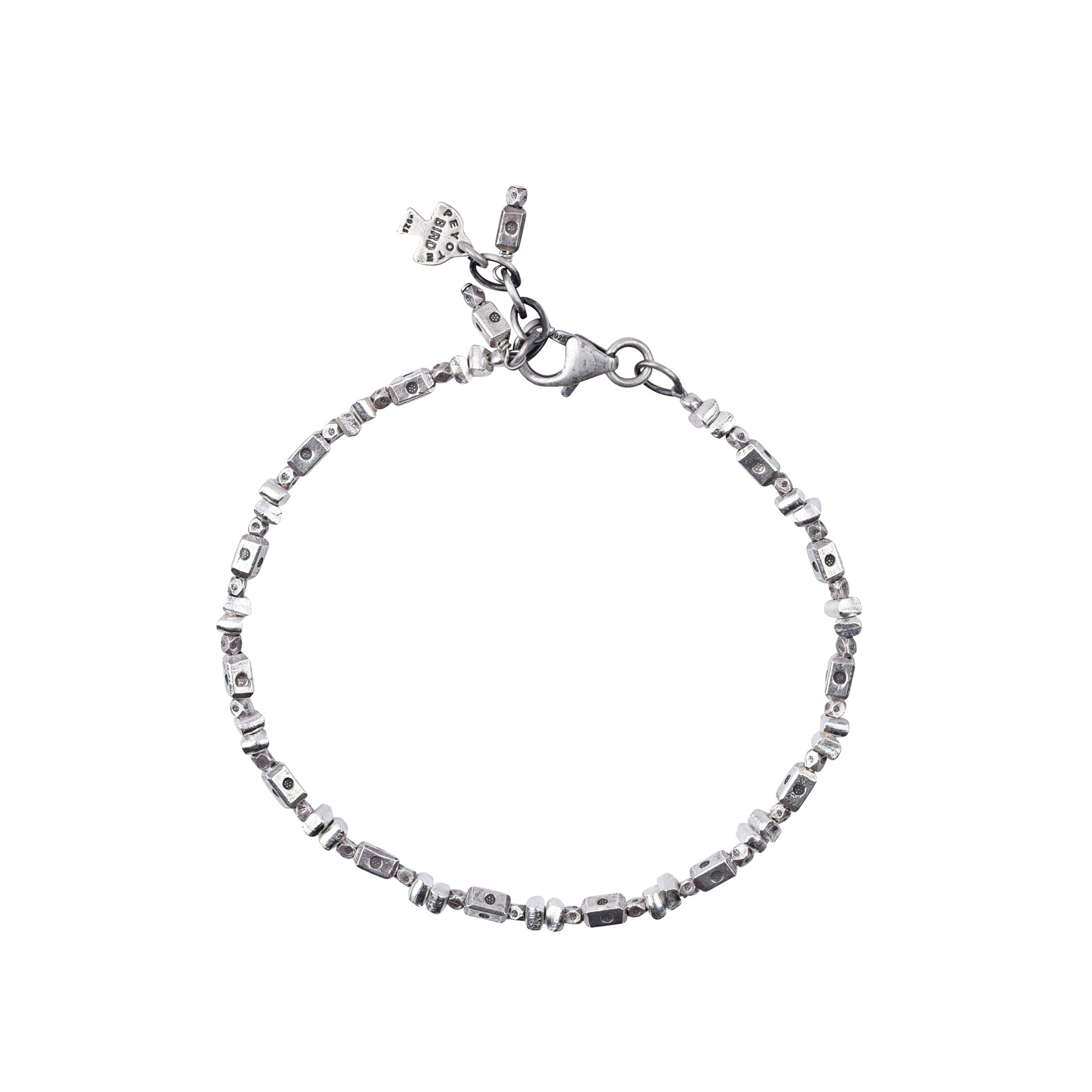Sterling Silver beaded bracelet with small decorative accents 