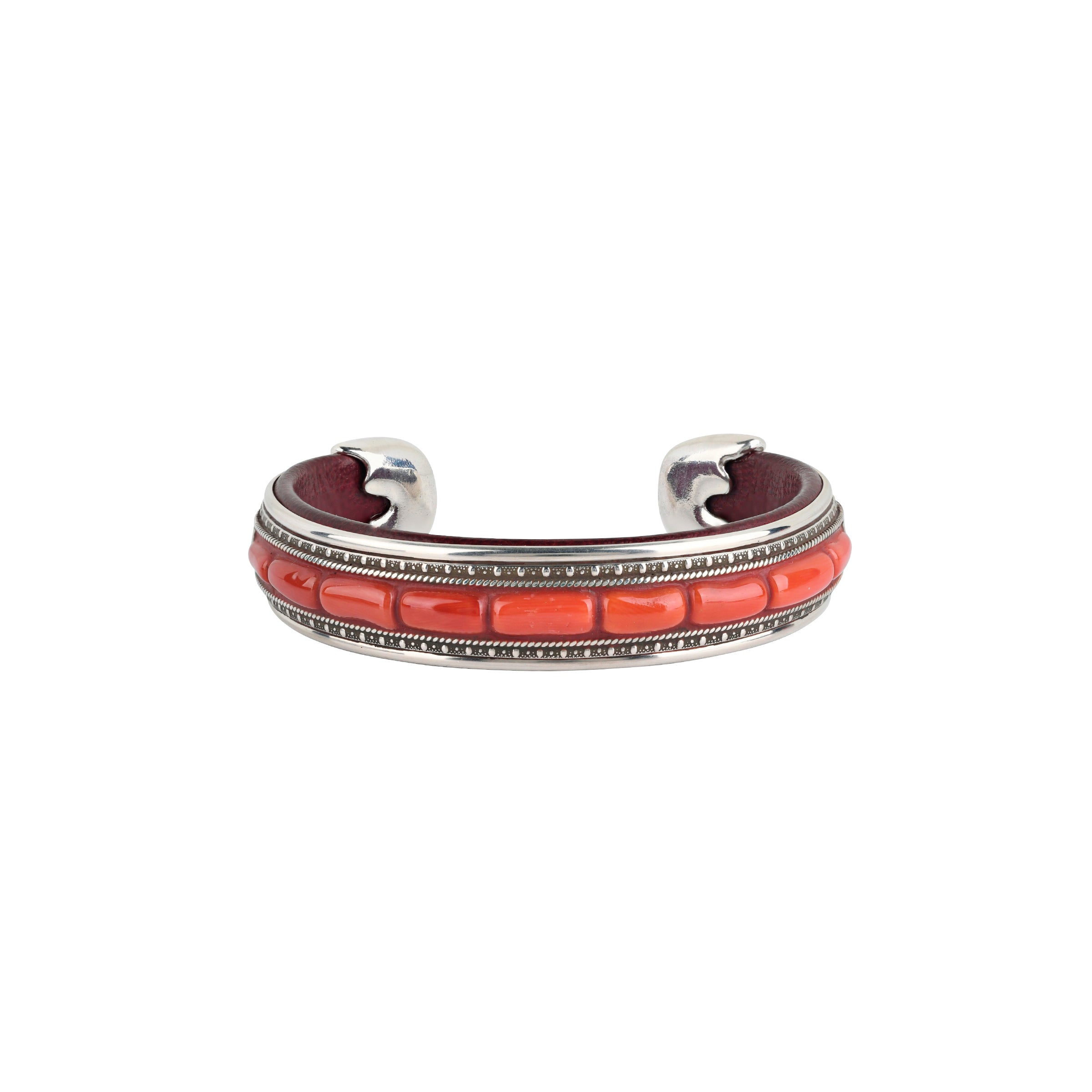 The Sangre Cuff by Charlie Favour is a leather and Sterling Silver cuff inlayed with Red Coral.