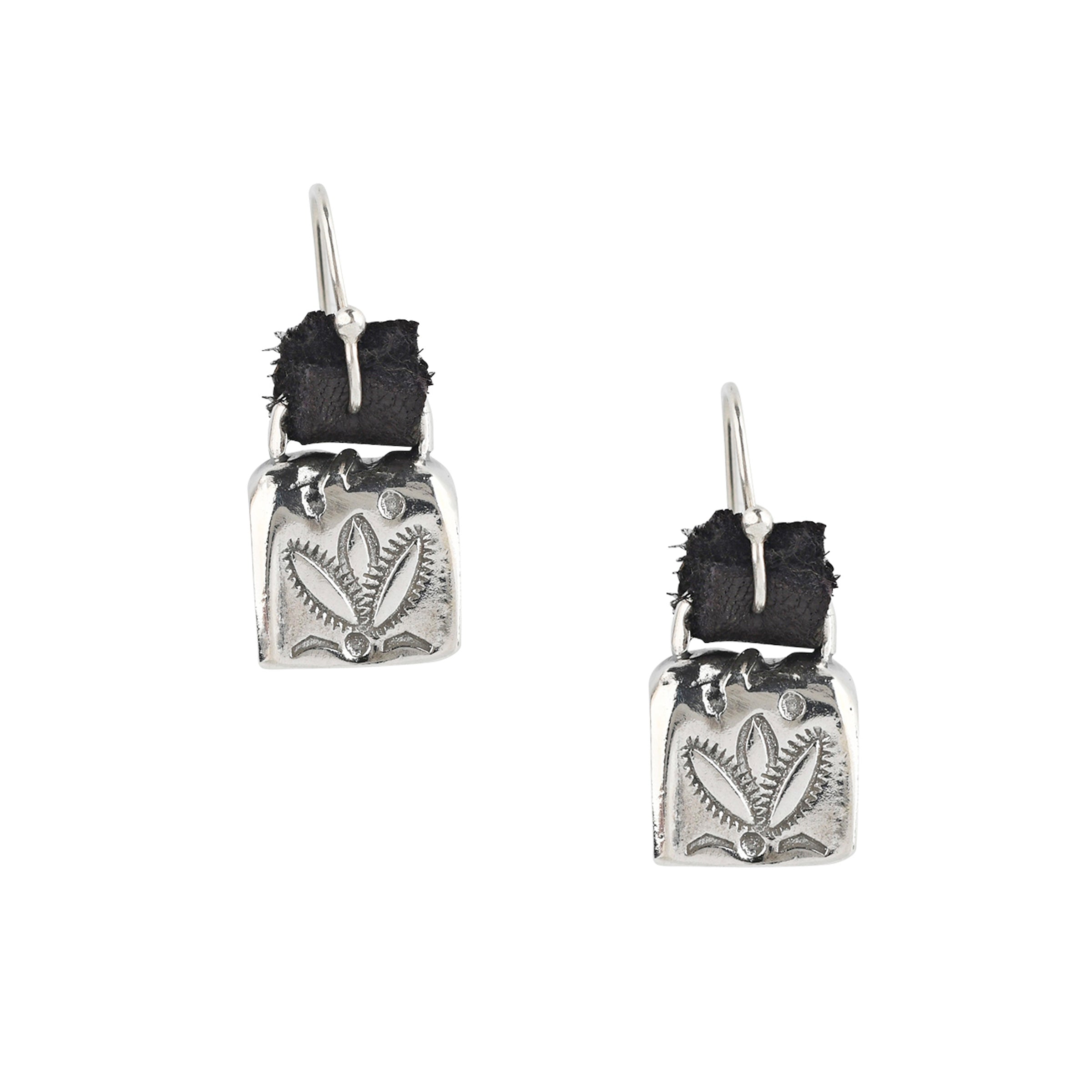 Earrings made with stamped Sterling Silver bells that actually jingle! Stamped with a Santa Fe Style floral desert design. Hung with brown, soft deerskin leather.