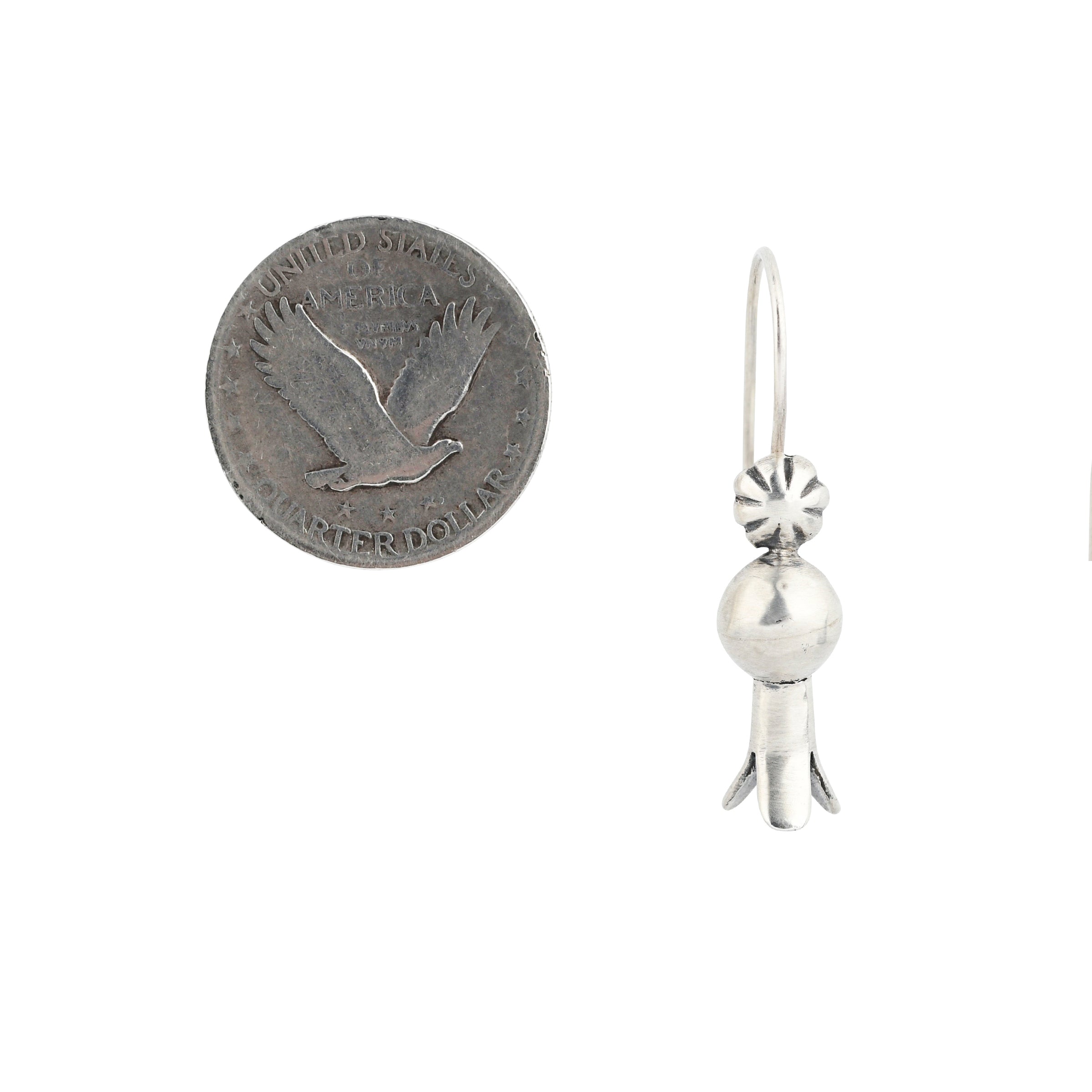 Made with Sterling Silver, these dangle earrings feature a drop blossom topped with a concho style detailing