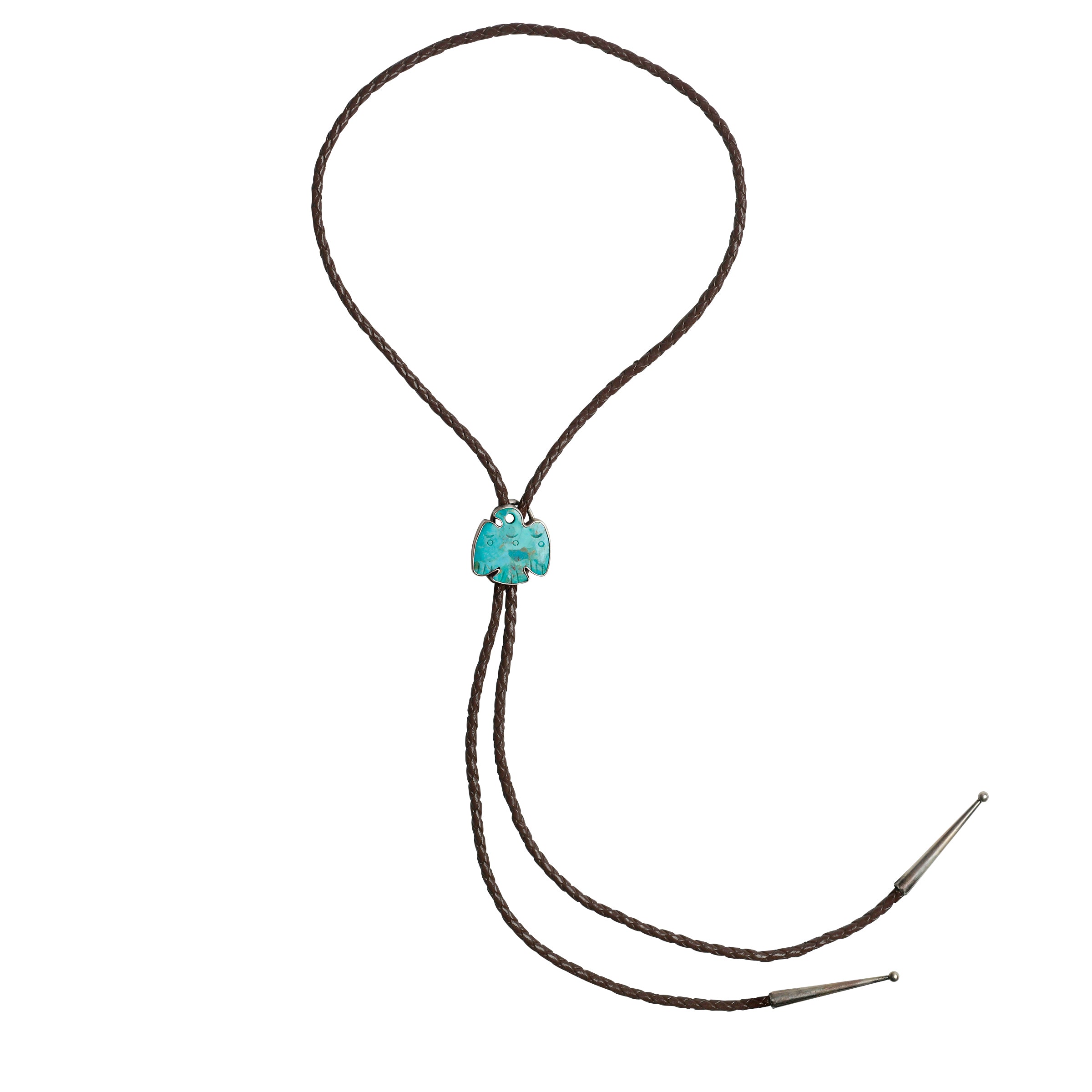 This bolo features a Thunderbird carved from Blue Turquoise in Sterling Silver. Strung on brown braided leather and finished with Sterling Silver tips.