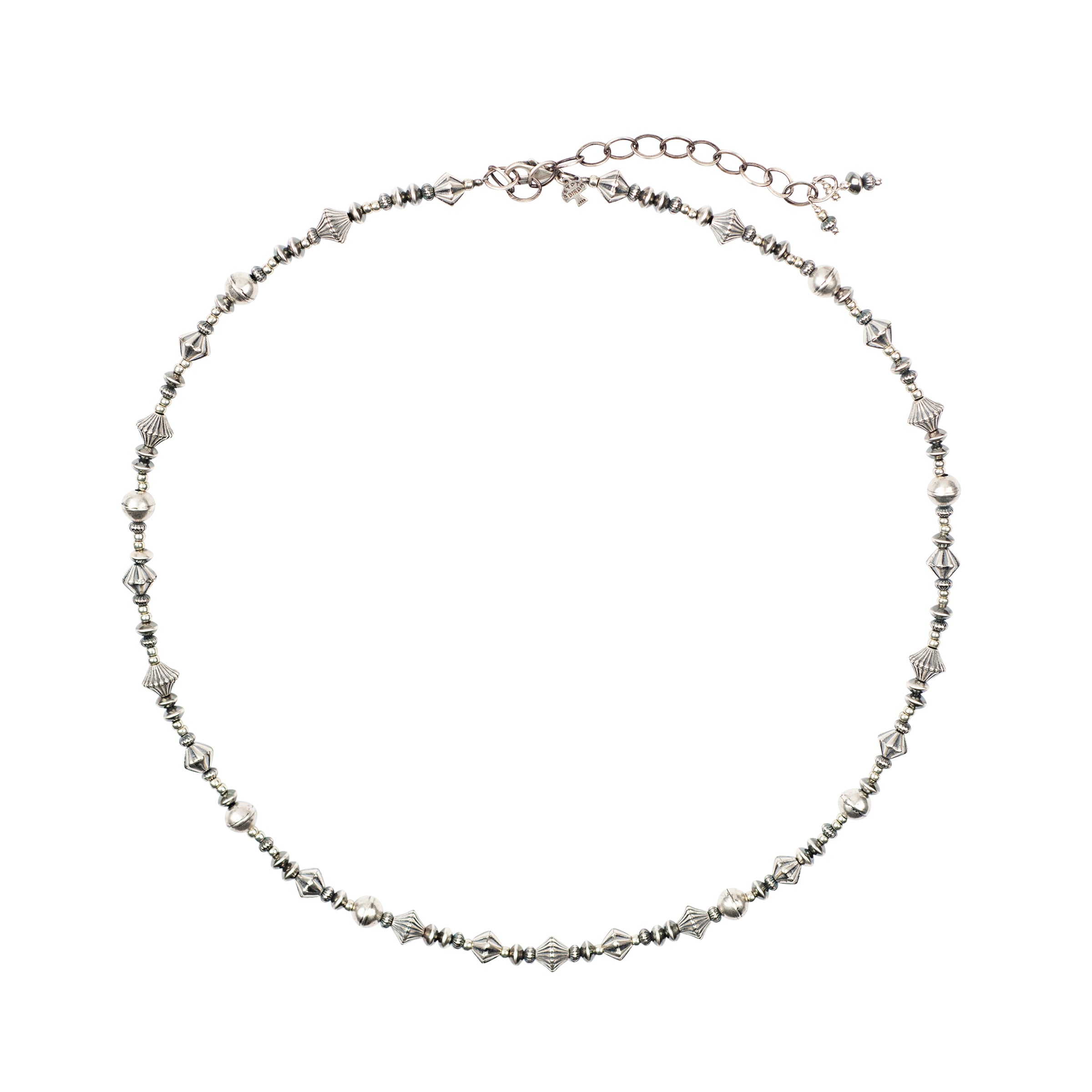 Sterling silver beads in various textures and patinas with extender chain and lobster claw closure hatband. 