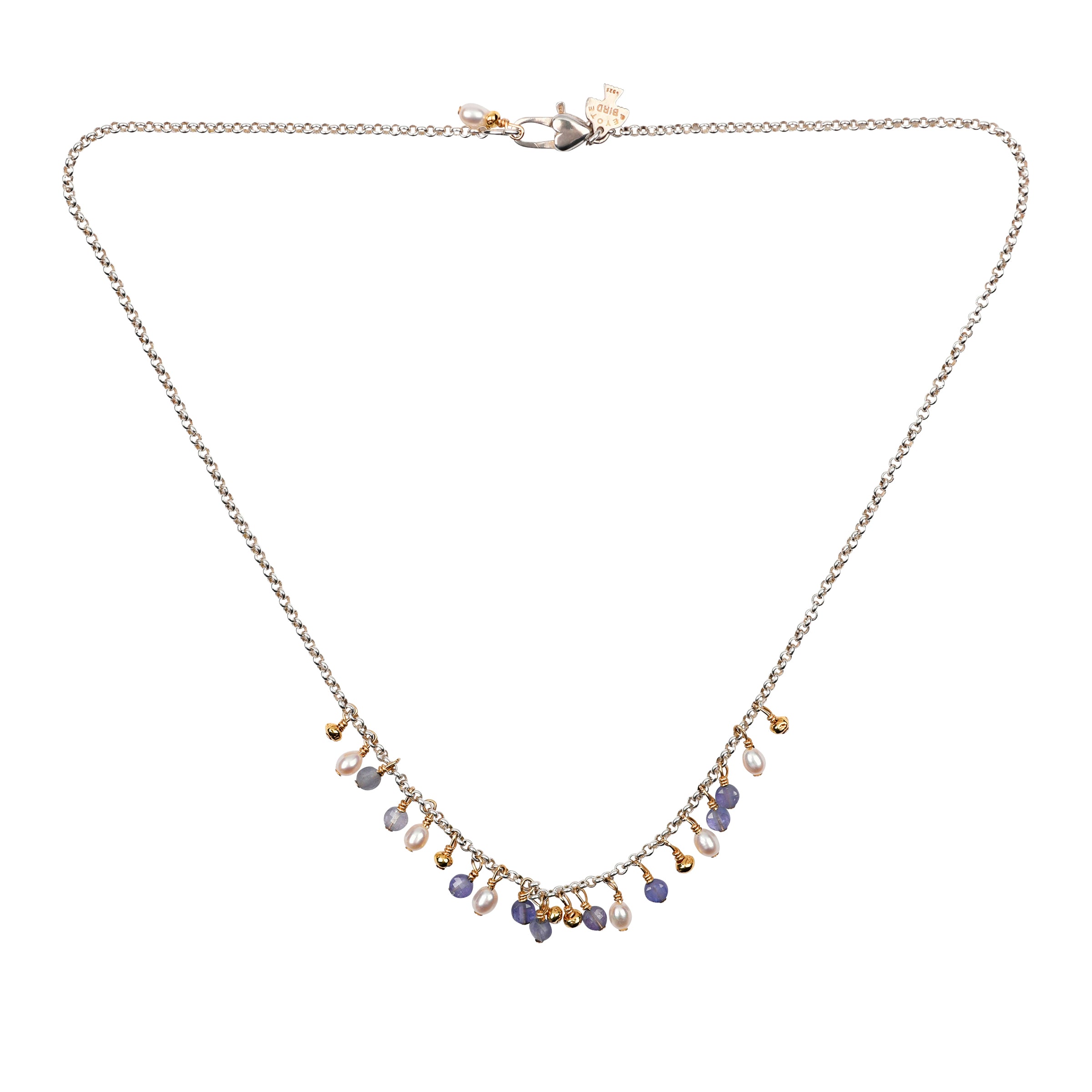 This sweet and charmy necklace features dangles of Tanzanite and Freshwater Pearl and would add a touch of elegance to any night-out look.