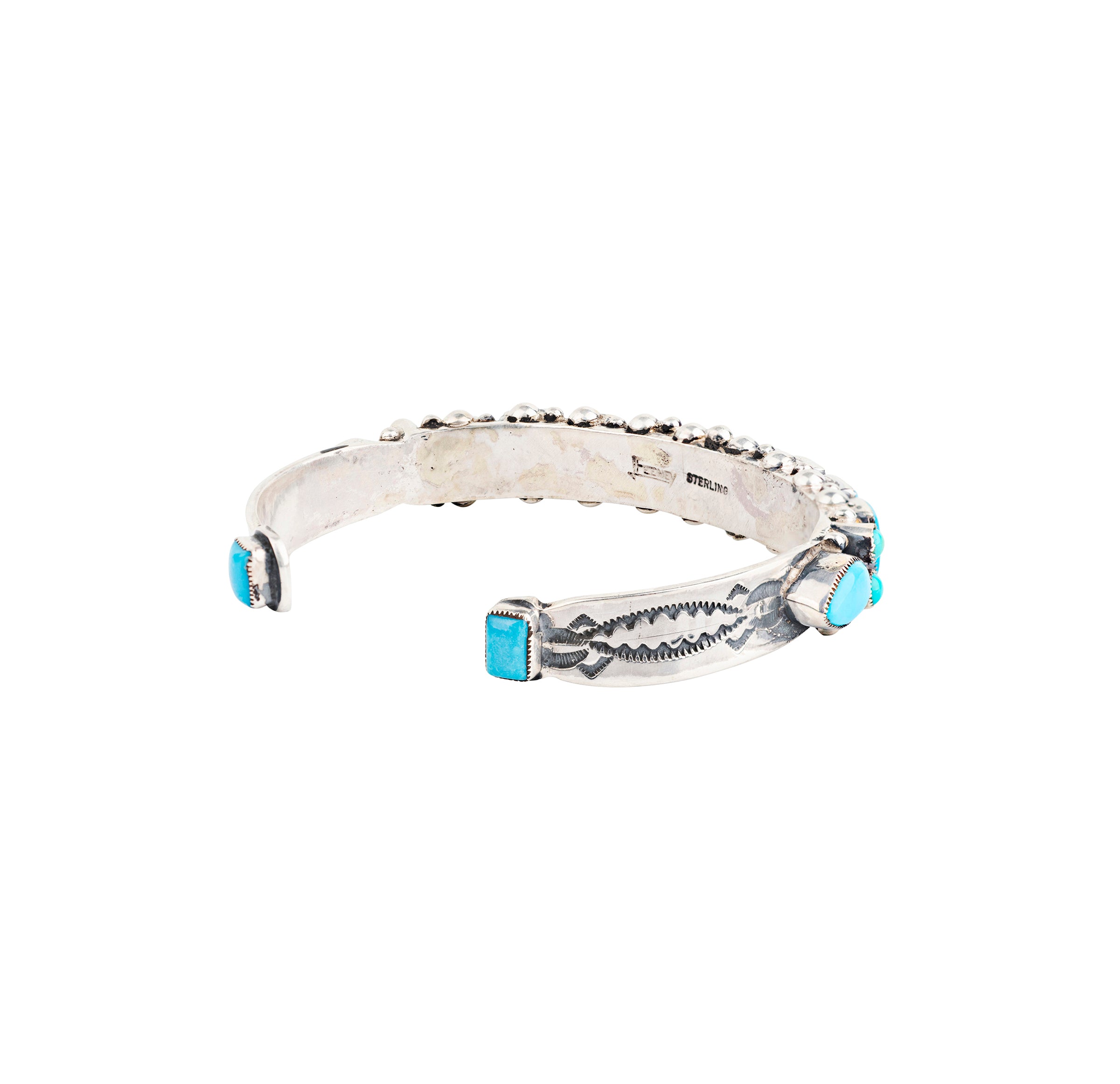 Sterling silver cuff bracelet with Sleeping Beauty Turquoise from artist Leo Feeney. Made in the USA.