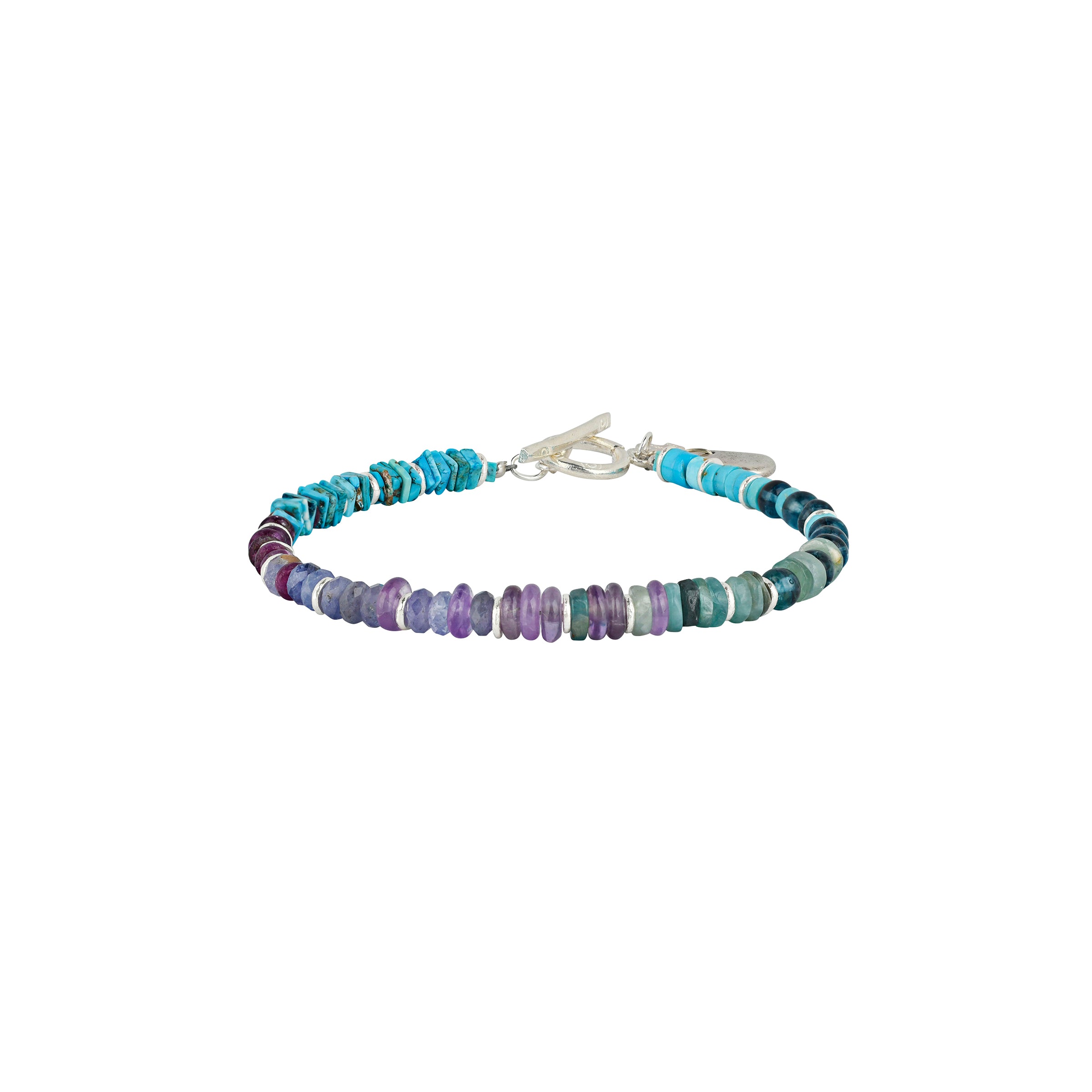 Beaded bracelet with Blue Turquoise, Quartz, Tanzanite, and Sterling Silver, with a sterling silver toggle closure.