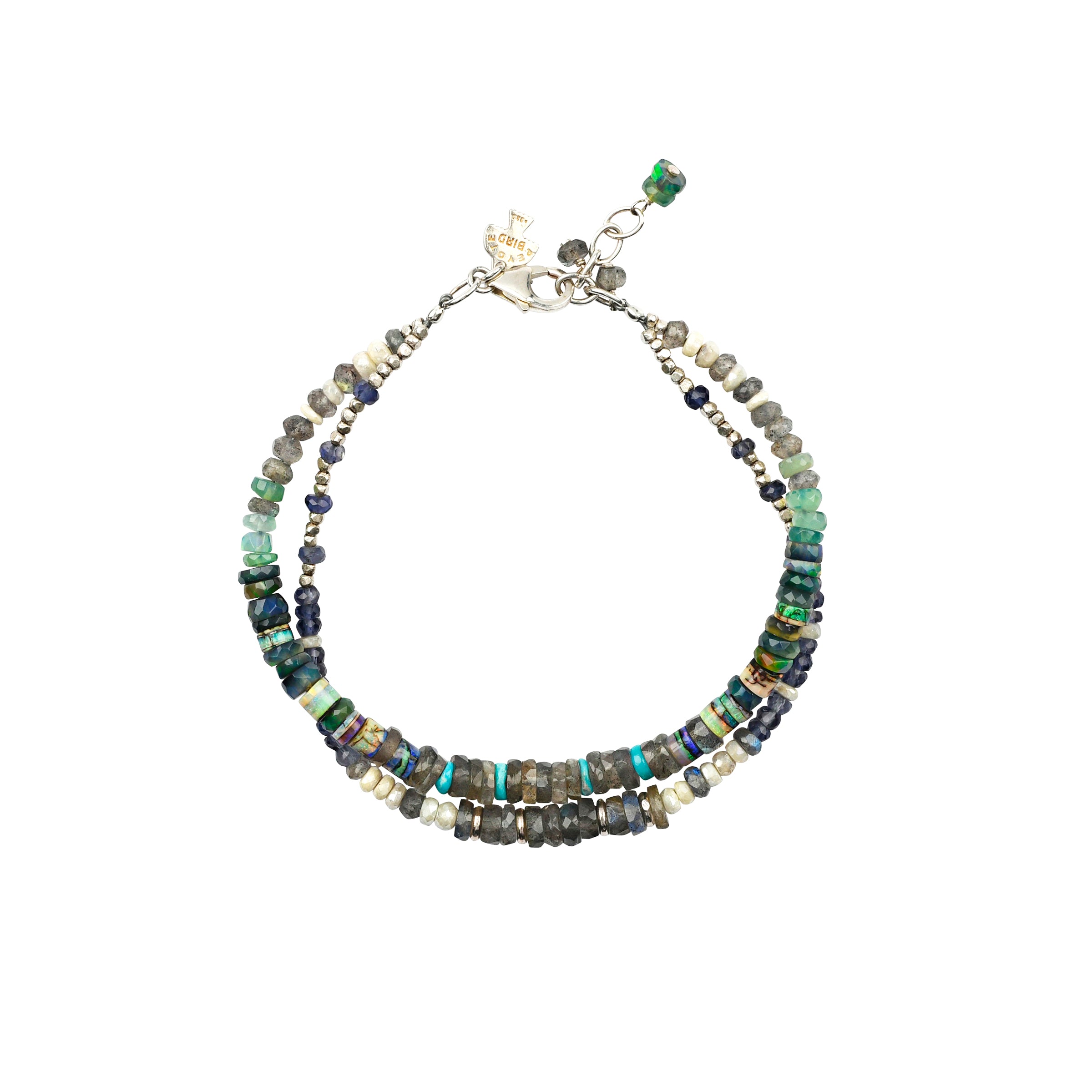 Full view of a sterling silver bracelet featuring Ethiopian opal, iolite, turquoise heishi, and labradorite