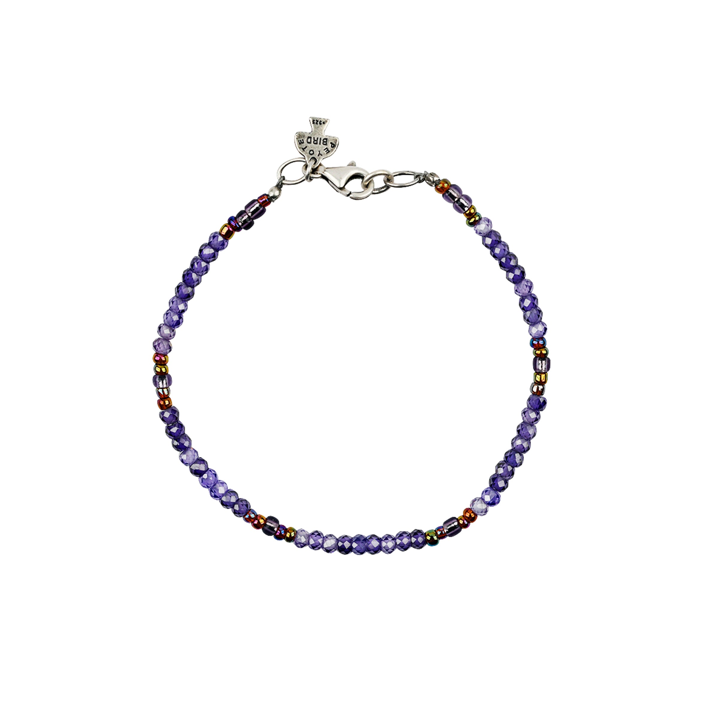 Beaded bracelet in lavander hues and copper colored pops of color with sterling silver lobster claw closure. 
