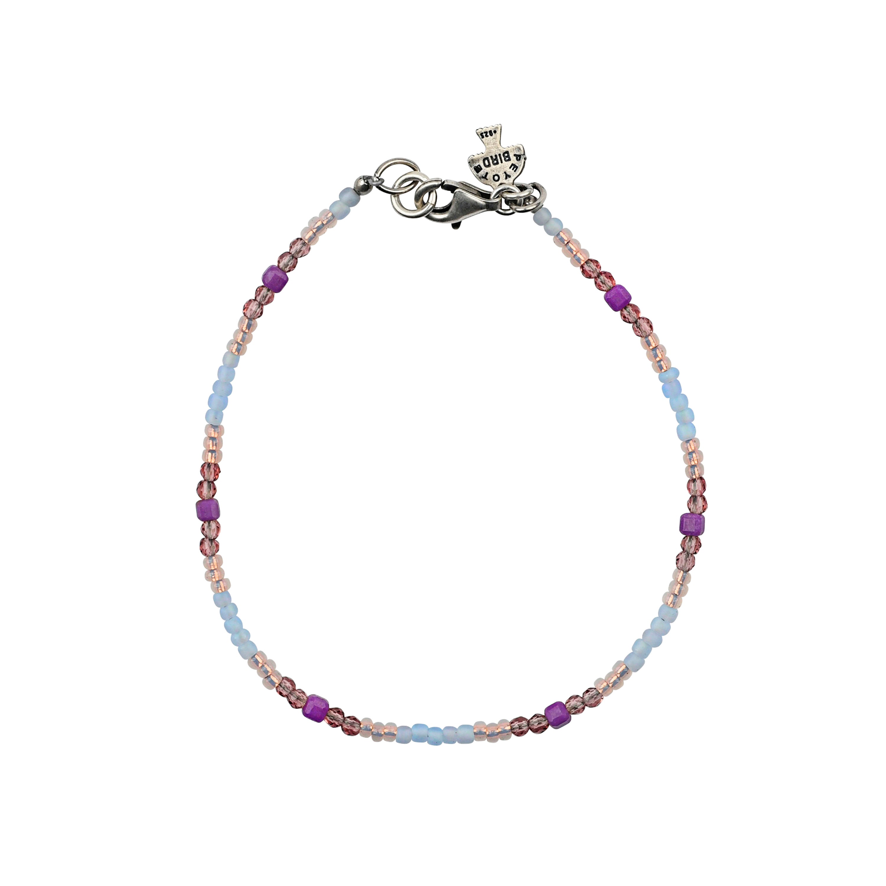 Beaded braceletwith violet, blue, and gold tone beads and sterling silver lobster claw clasp. 