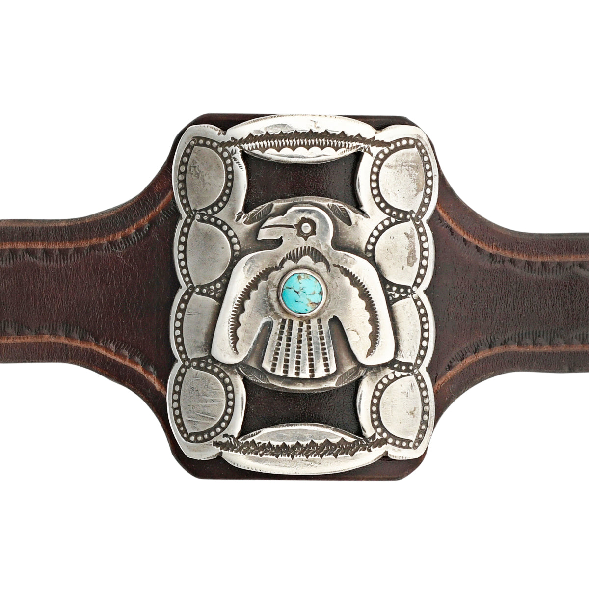 A classic bow guard featuring turquoise and a thunderbird handcrafted from Ingot Coin Silver and Turquoise.