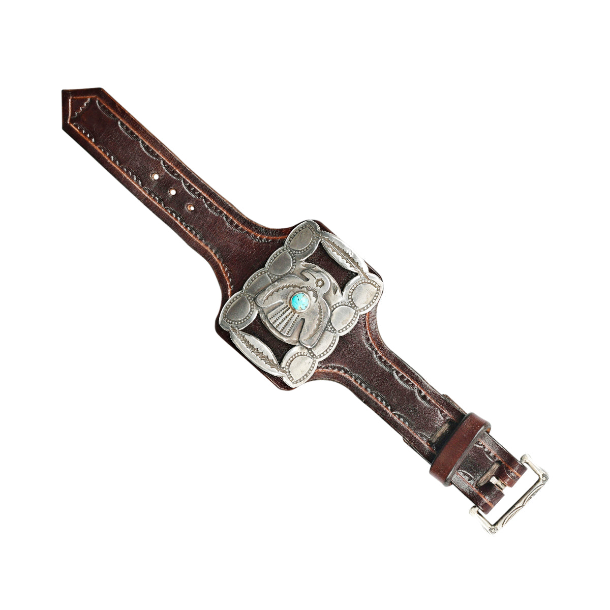 A classic bow guard featuring turquoise and a thunderbird handcrafted from Ingot Coin Silver and Turquoise.