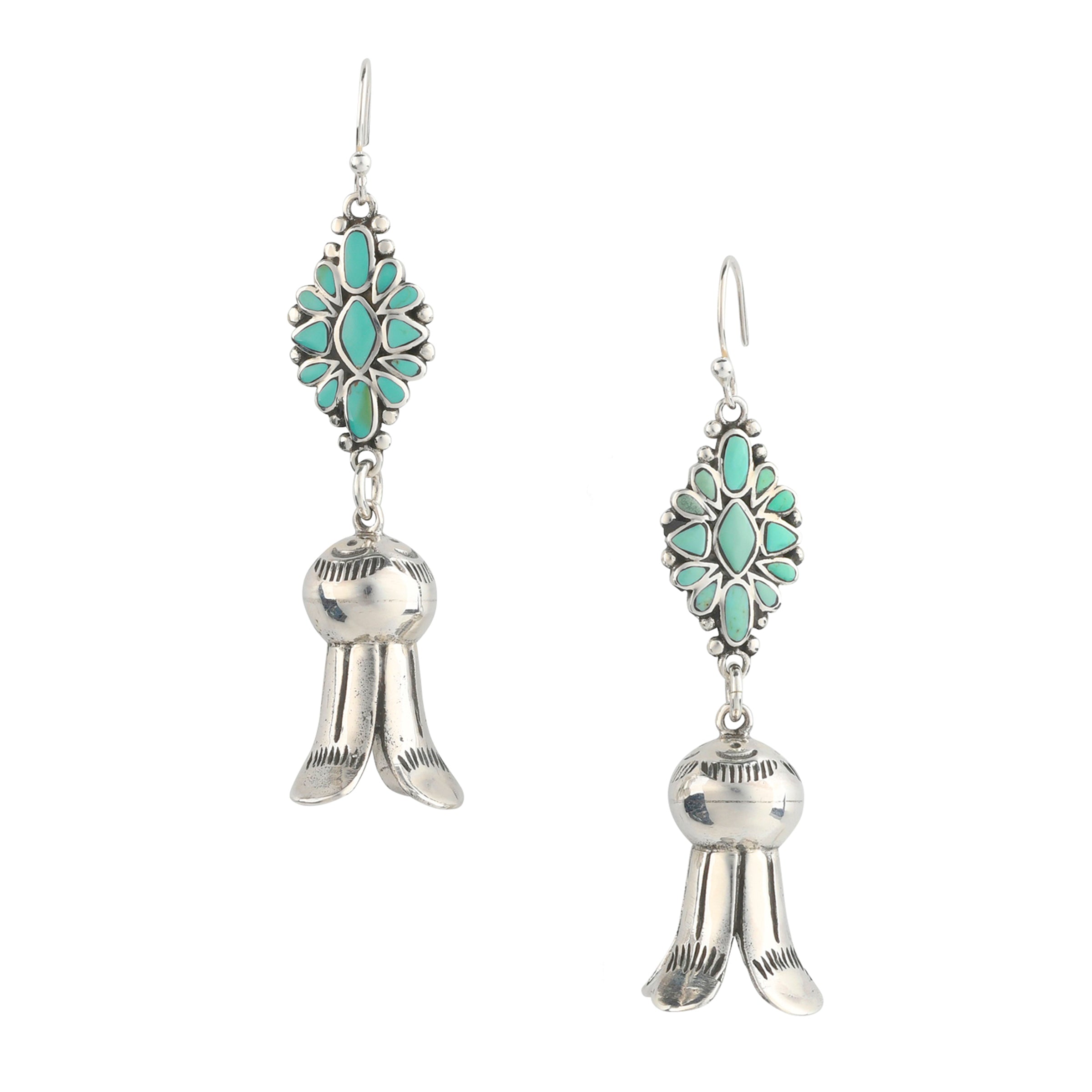 Suspended from sterling silver ear wires turquoise cluster earrings lead to one squash blossom with hatching detail focal point. 