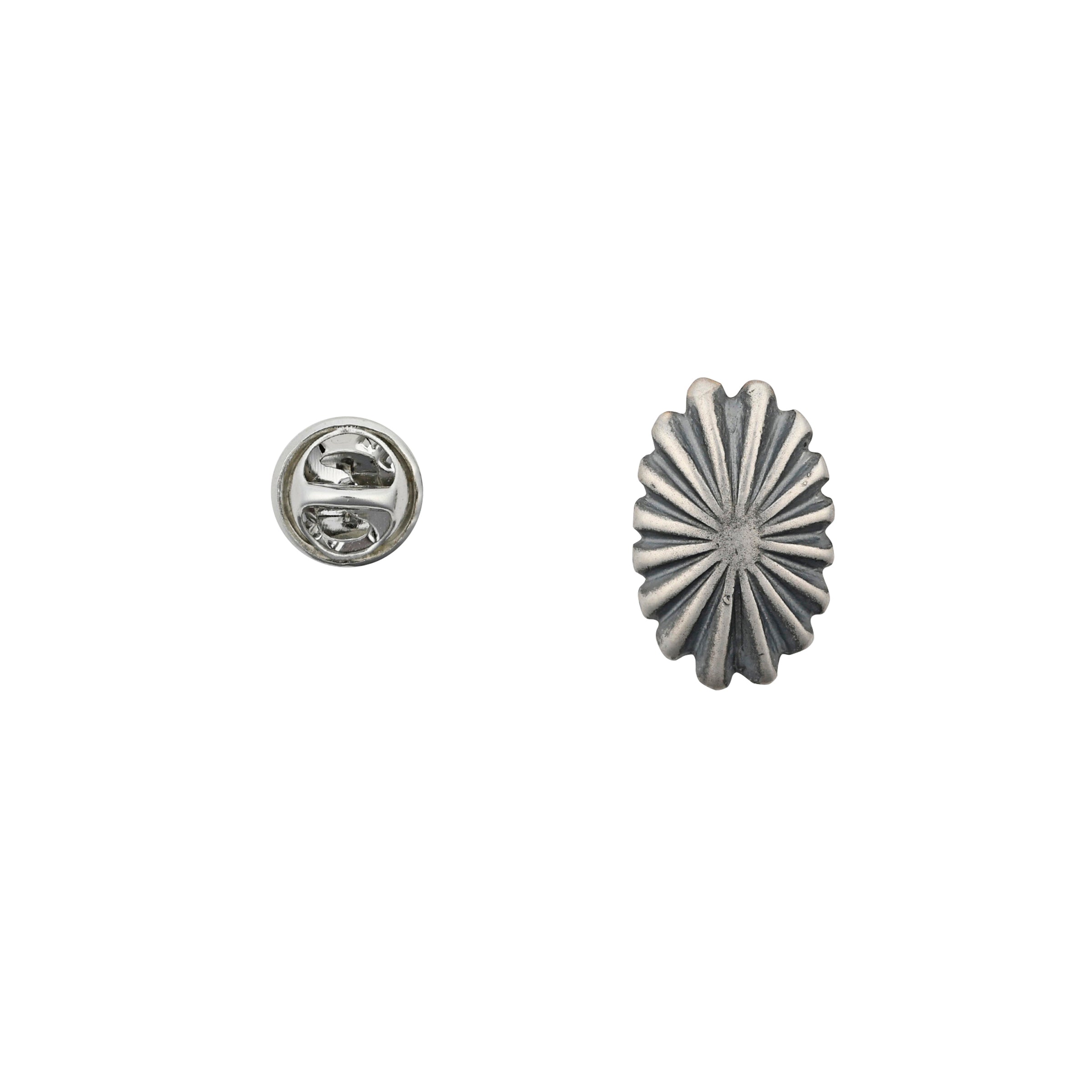 Sterling silver oval concho hat pin with raised surfaces next to pin back. 