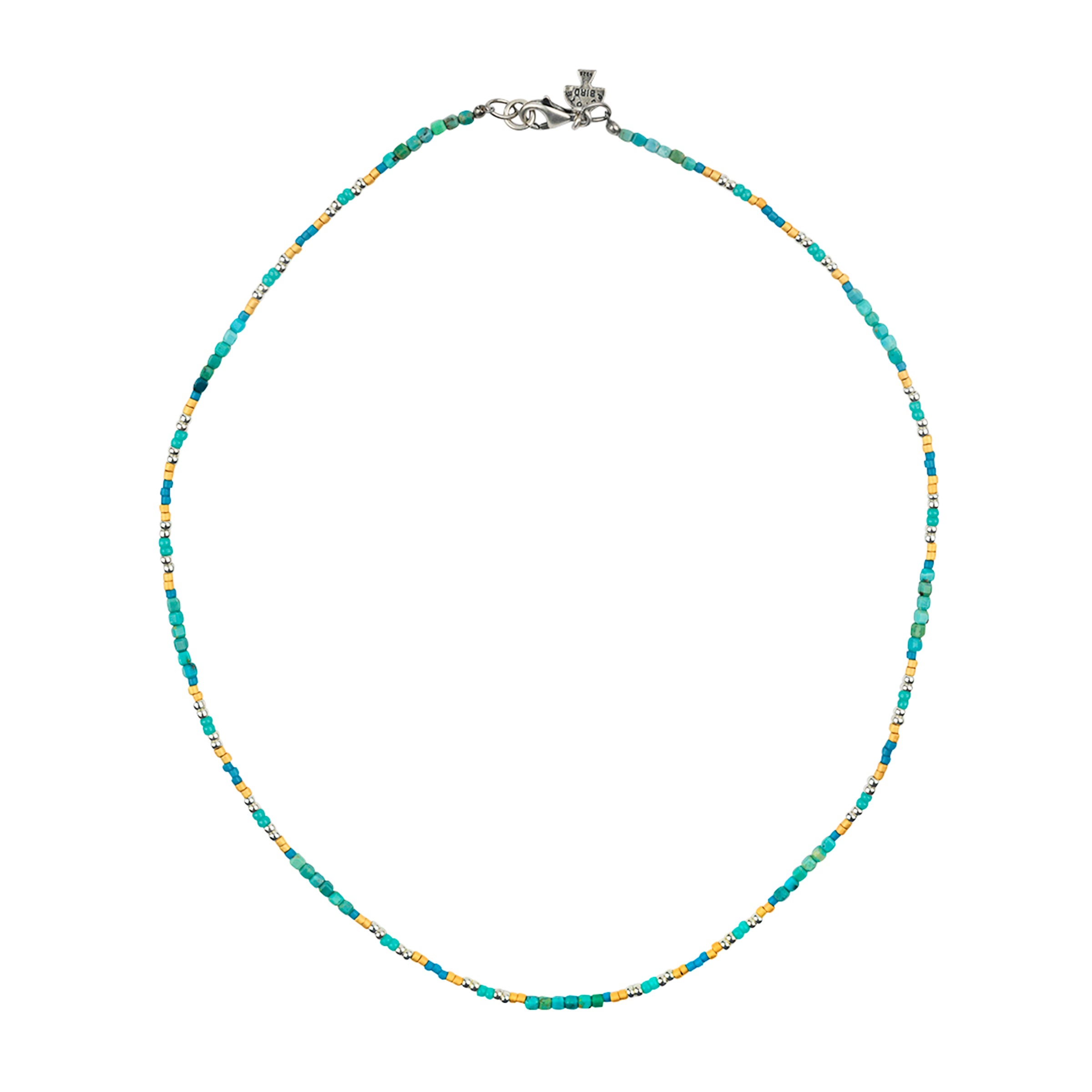 Beaded necklace in turquoise tones mixed with silver and gold beads and lobster cloaw clasp. 