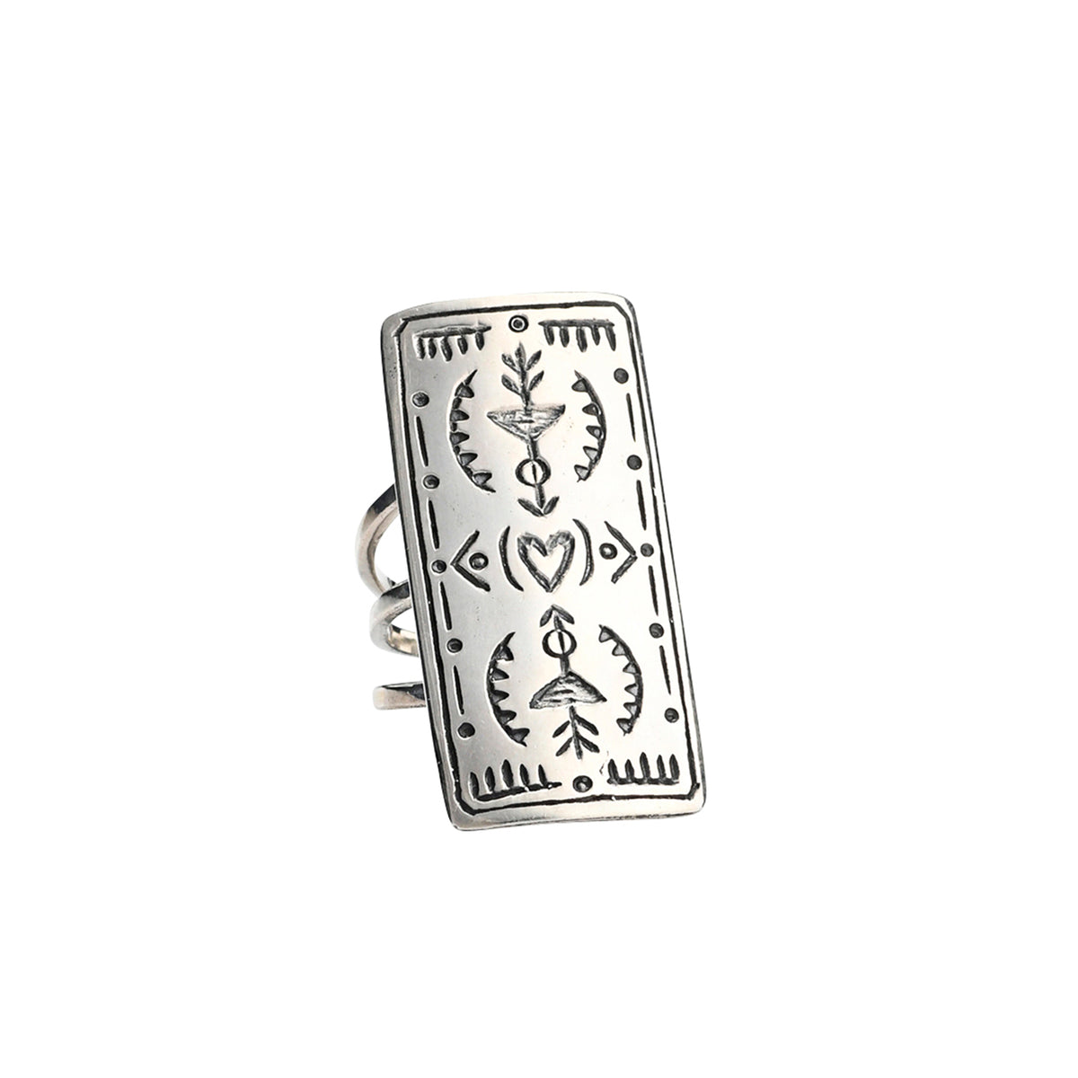 A sterling silver shield ring with intricate stamped arrows and hearts with geometric patterns and a split shank design.