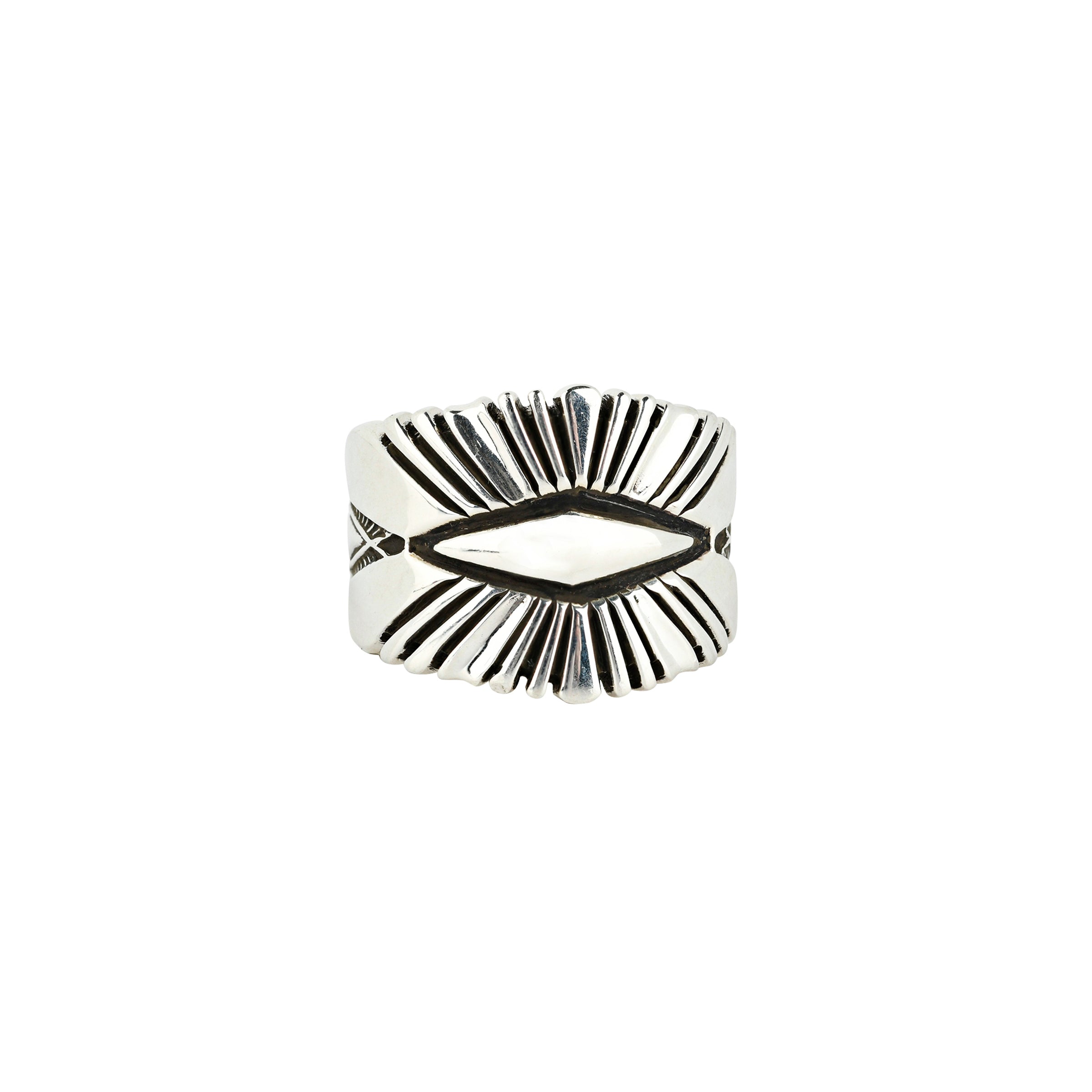 A sterling silver statement ring featuring a sleek diamond shape as the centerpiece with beams radiating from the center