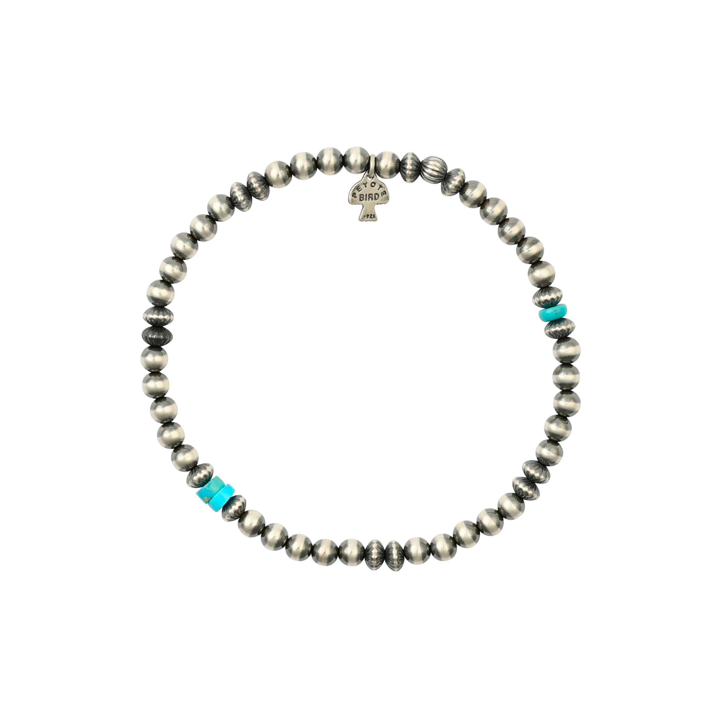Stertling silver beads and pops of turquoise in stretch bracelet. 