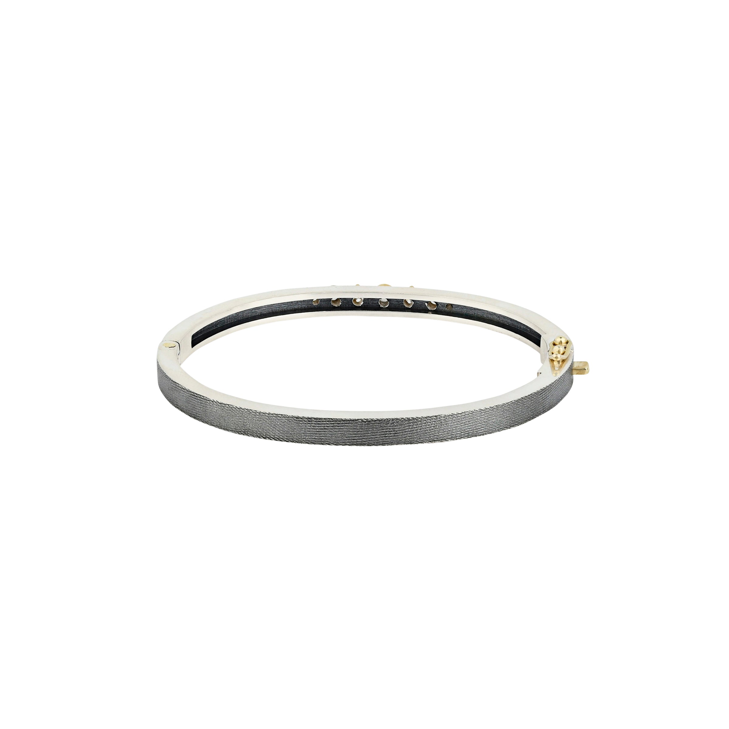Silver circular bracelet with gold hinge 