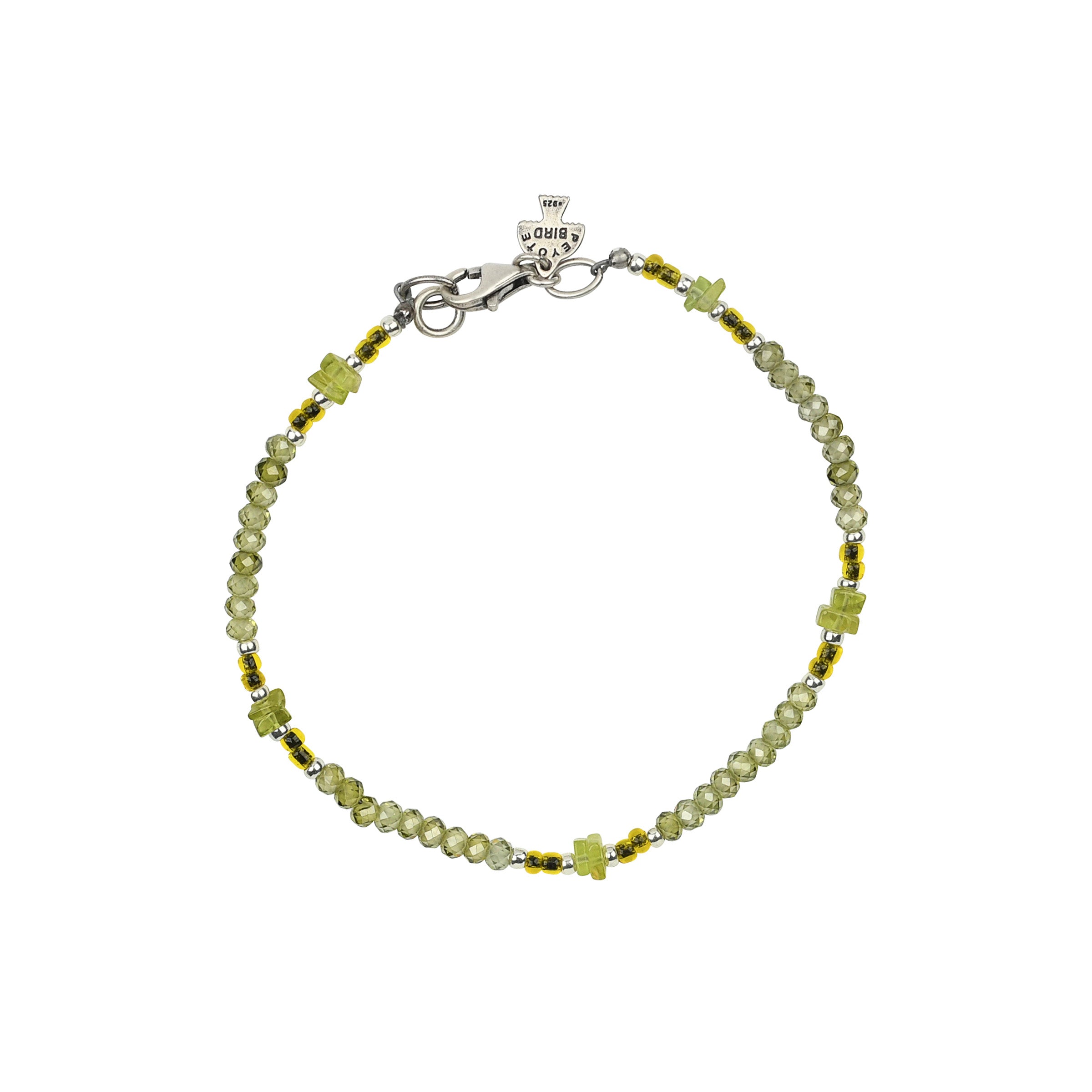 Green toned beads in beaded bracelet with sterling silver lobster claw clasp. 