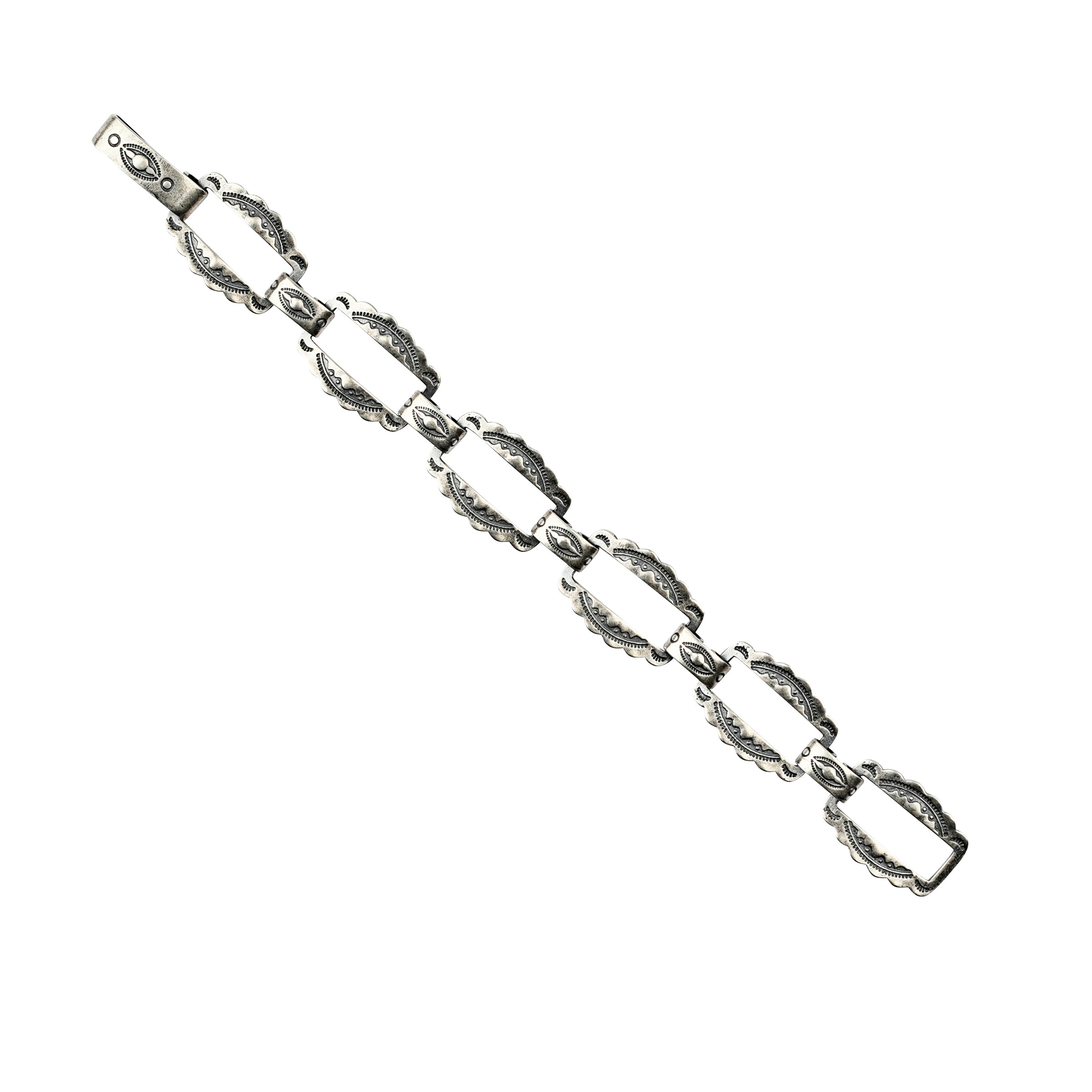 Sterling silver stamped link bracelet.