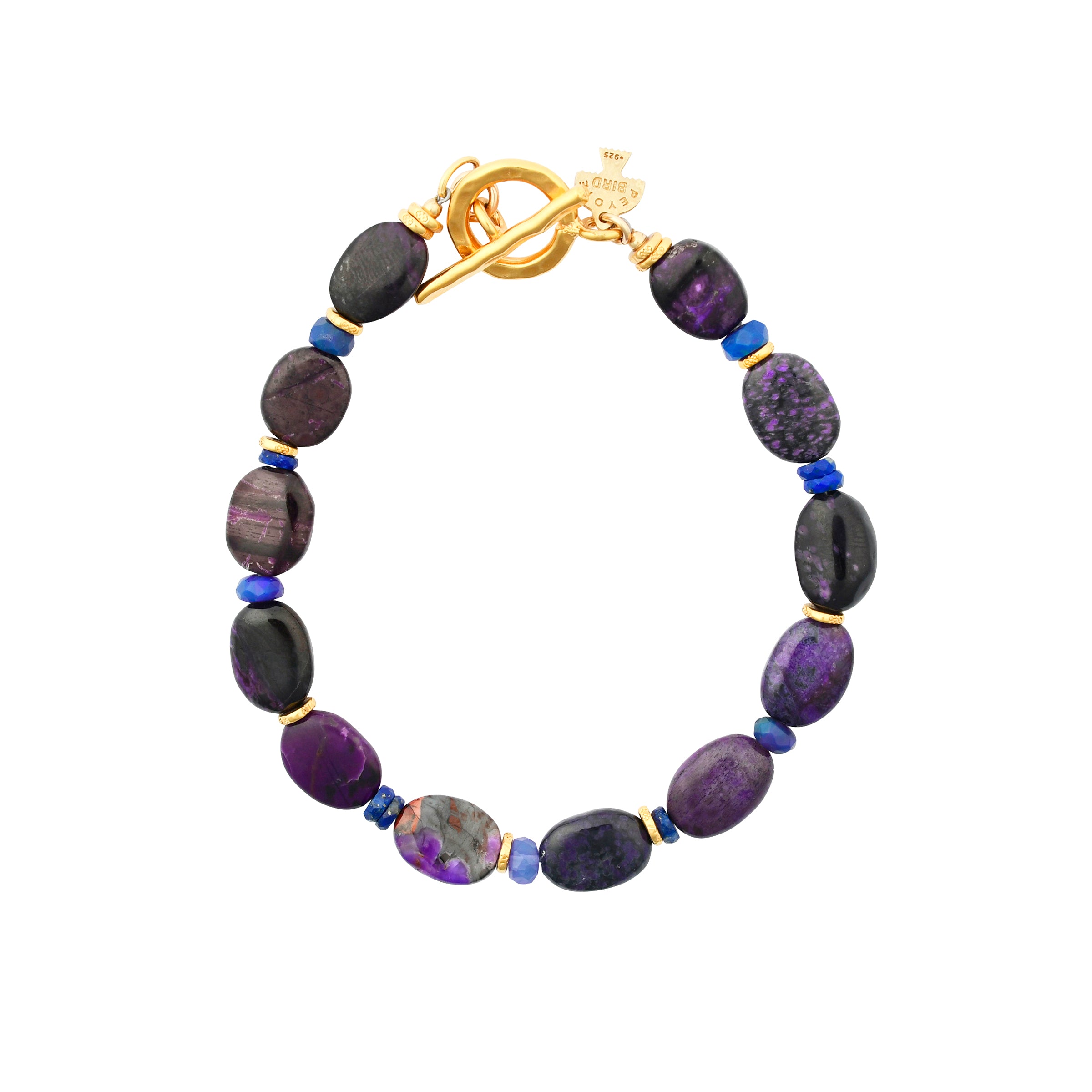 Large oval purple spiny oyster shell beads with lapis and opal and gold accent beads in this beaded bracelet with gold tone toggle closure. 