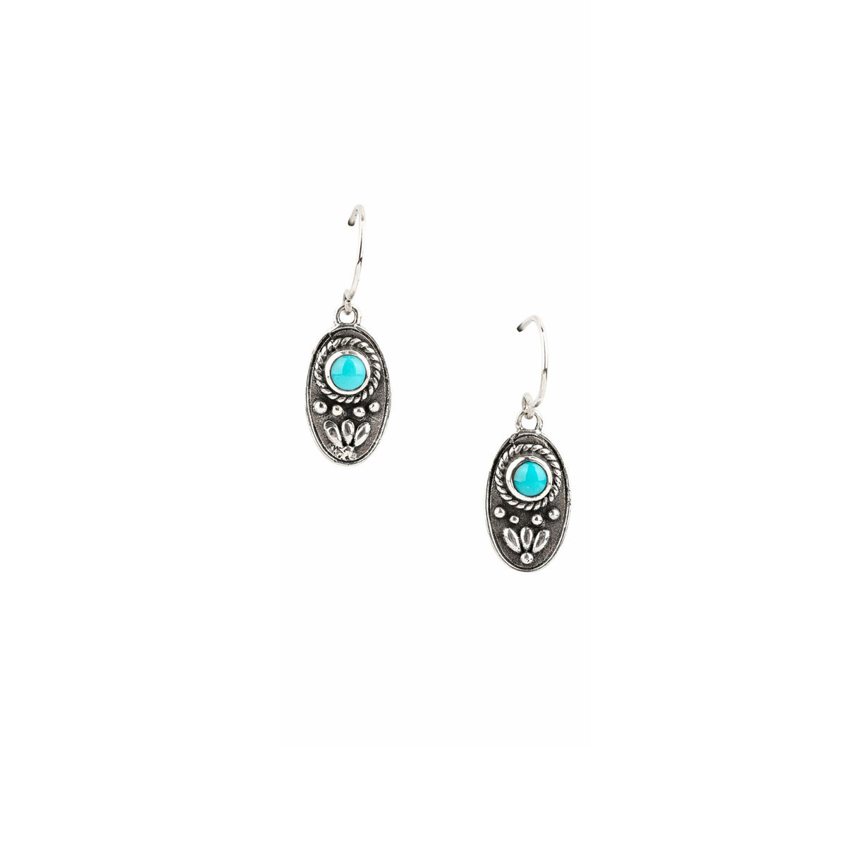 Sterling silver oval shaped dangle earrings with added silver design elements and blue turquoise stones at the top.