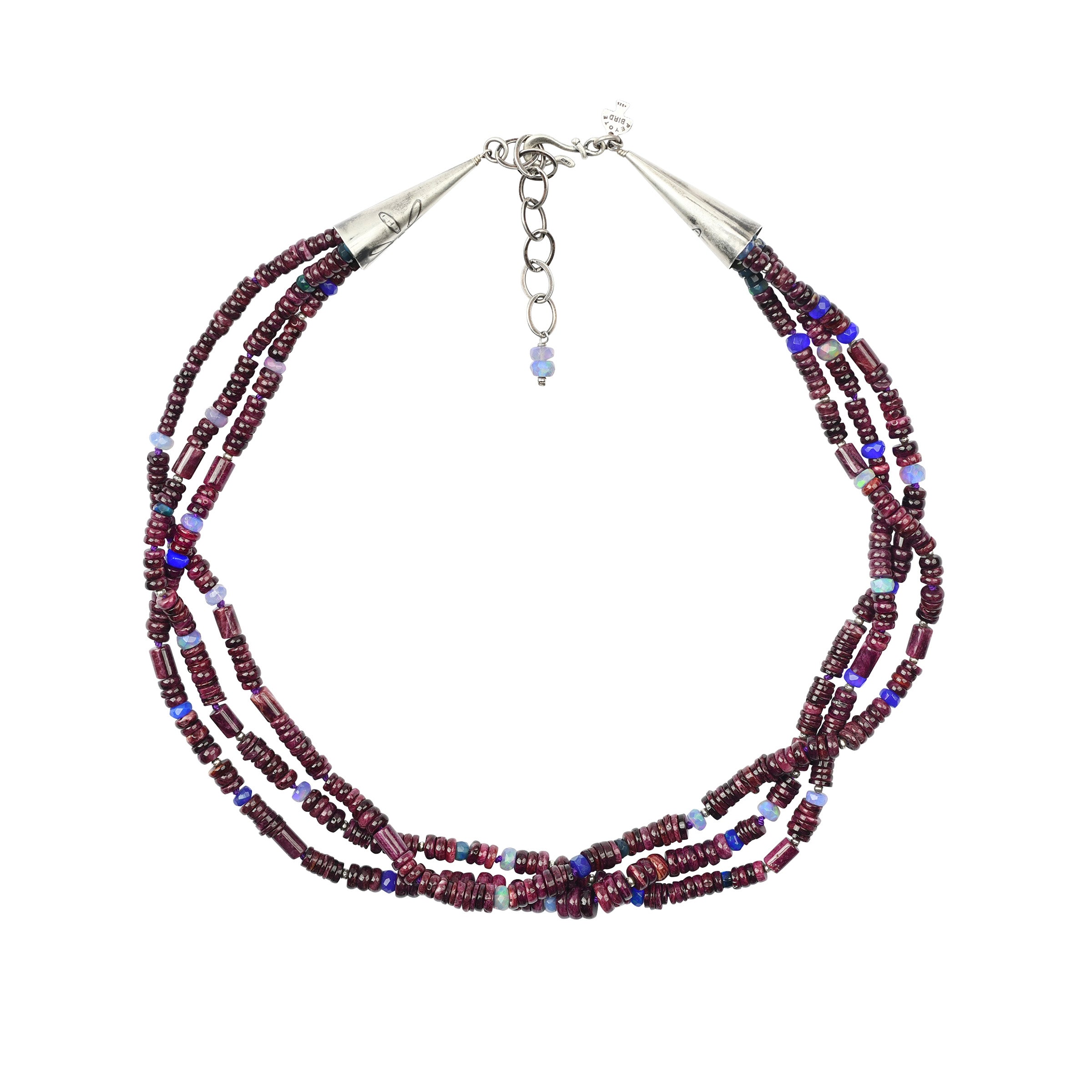 3 strand beaded necklace of purpole tones and blue pops of color throughout with sterling silver cones and hook closure with extender chain. 