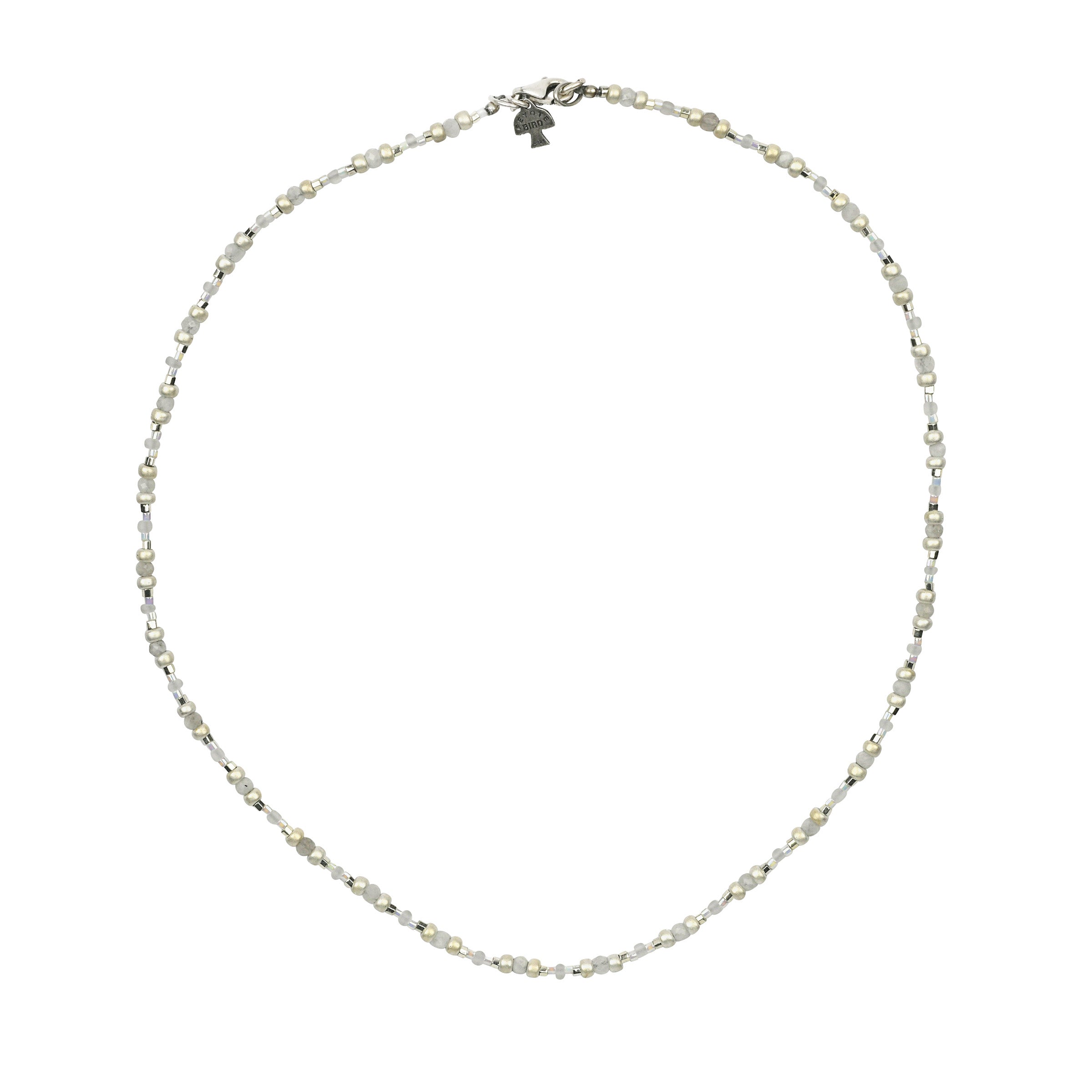 White tone beaded necklace with sterling silver lobster claw closure. 